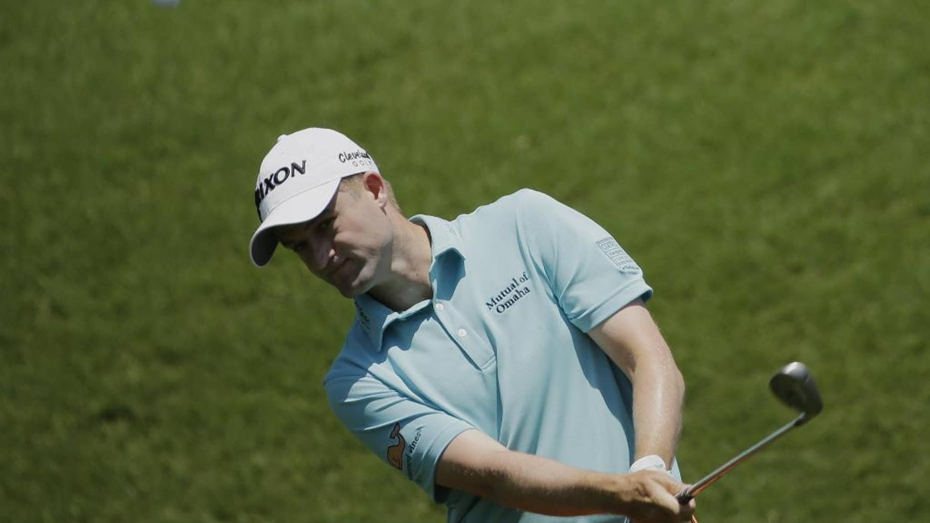 Russell Knox chips onto the second green during the third round of The Players Championship golf tournament Saturday, May 14, 2016, in Ponte Vedra Beach, Fla. (AP Photo/Chris O'Meara)