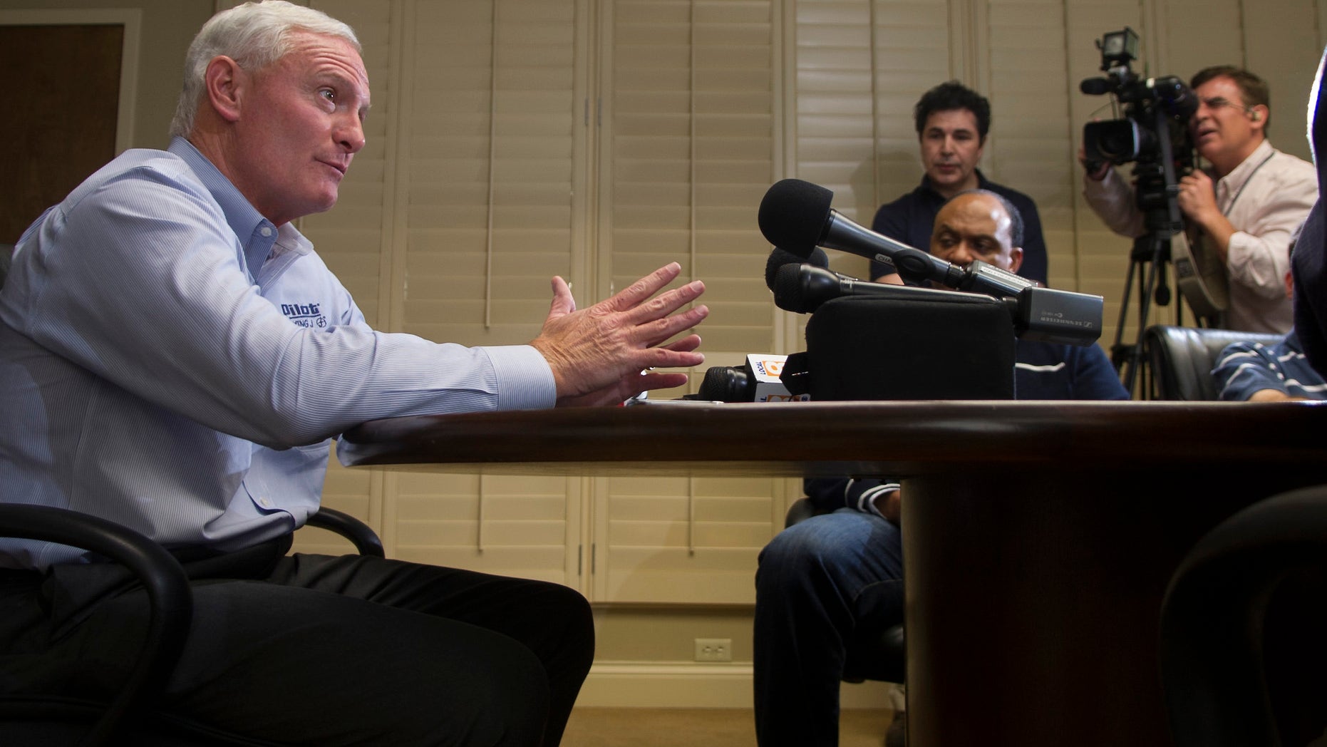 Pilot Flying J CEO Jimmy Haslam speaks to the media during a news conference at the Pilot Flying J headquarters Tuesday, April 16, 2013, in Knoxville, Tenn. Haslam said FBI and IRS raid Monday on the company was part of a federal criminal investigation into claims of failure to pay rebates to trucking customers. (AP Photo/Knoxville News Sentinel, J. Miles Cary)