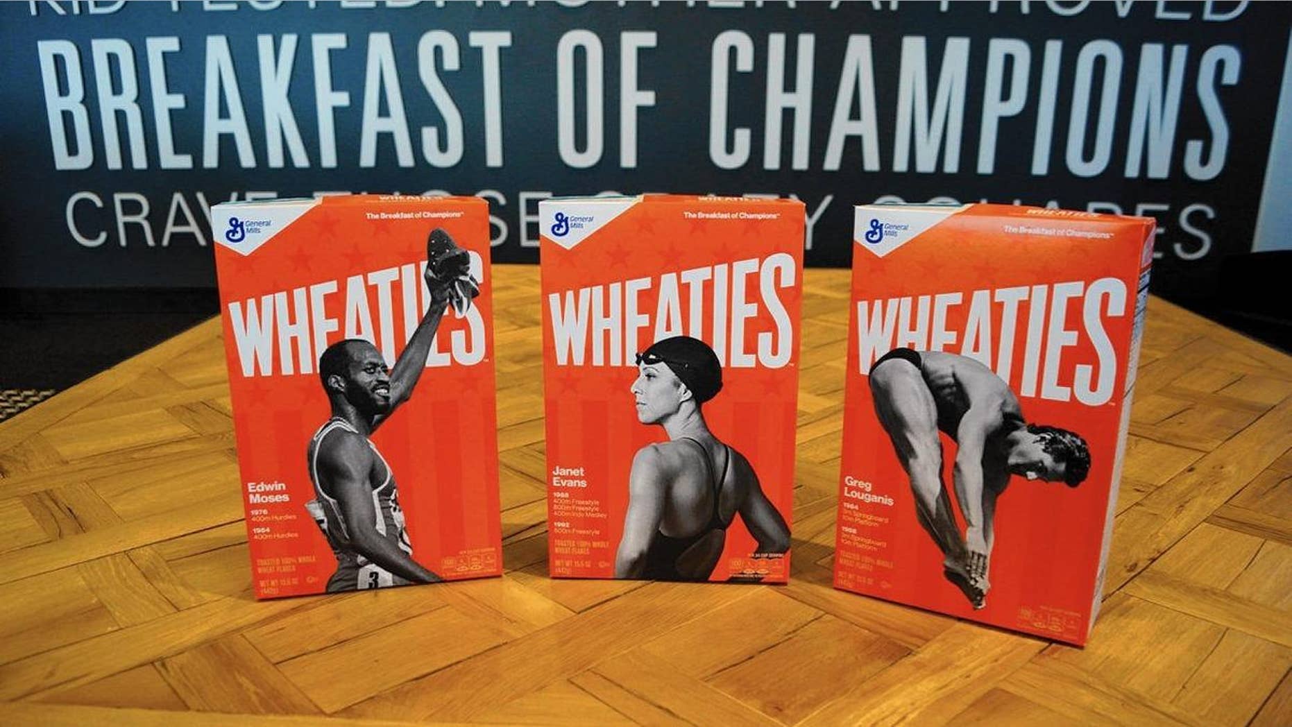 Edwin Moses, left, Janet Evans and Greg Louganis will appear on Wheaties boxes starting in May.