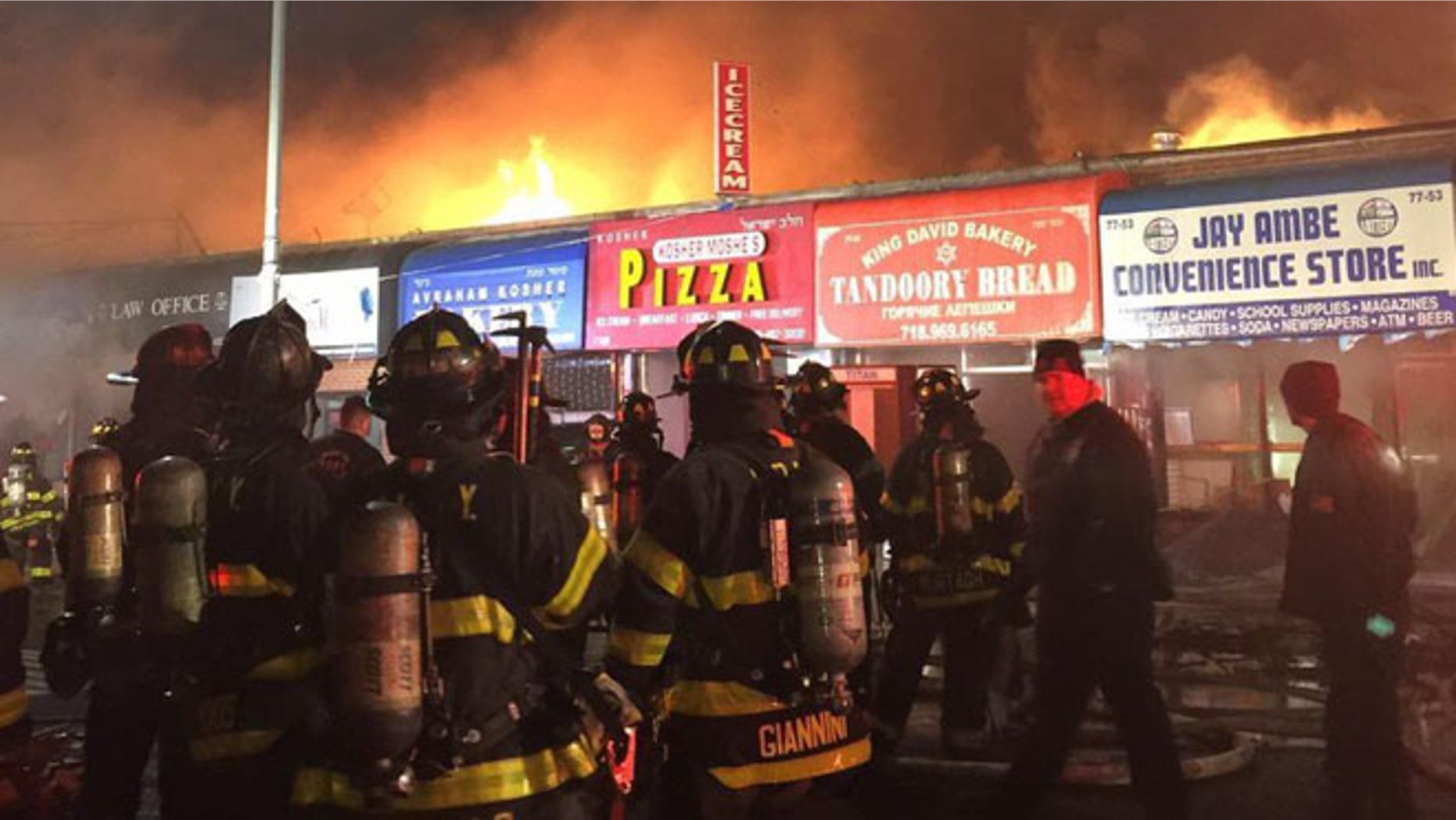 New York City firefighters at the scene of a fire in Kew Gardens Hills Friday. (FDNY)