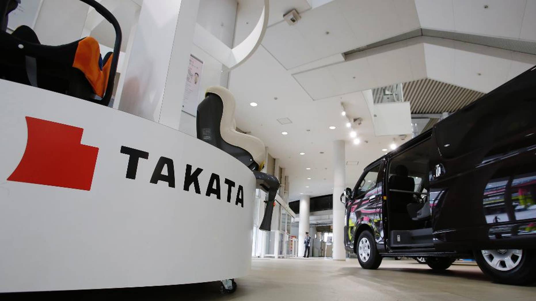 FILE - In this Nov. 6, 2014 file photo, child seats manufactured by Takata Corp. are displayed at a Toyota Motor Corp.'s showroom in Tokyo. Toyota and Nissan Motor Co. are expanding their recalls over problem air bags made by Japanese supplier Takata Corp. Toyota said Wednesday, May 13, 2015, it was recalling nearly 5 million more vehicles globally for the air bag inflator problem. Some 637,000 of them in the United States. In Japan, it is recalling nearly 1.4 million vehicles. (AP Photo/Shizuo Kambayashi, File)