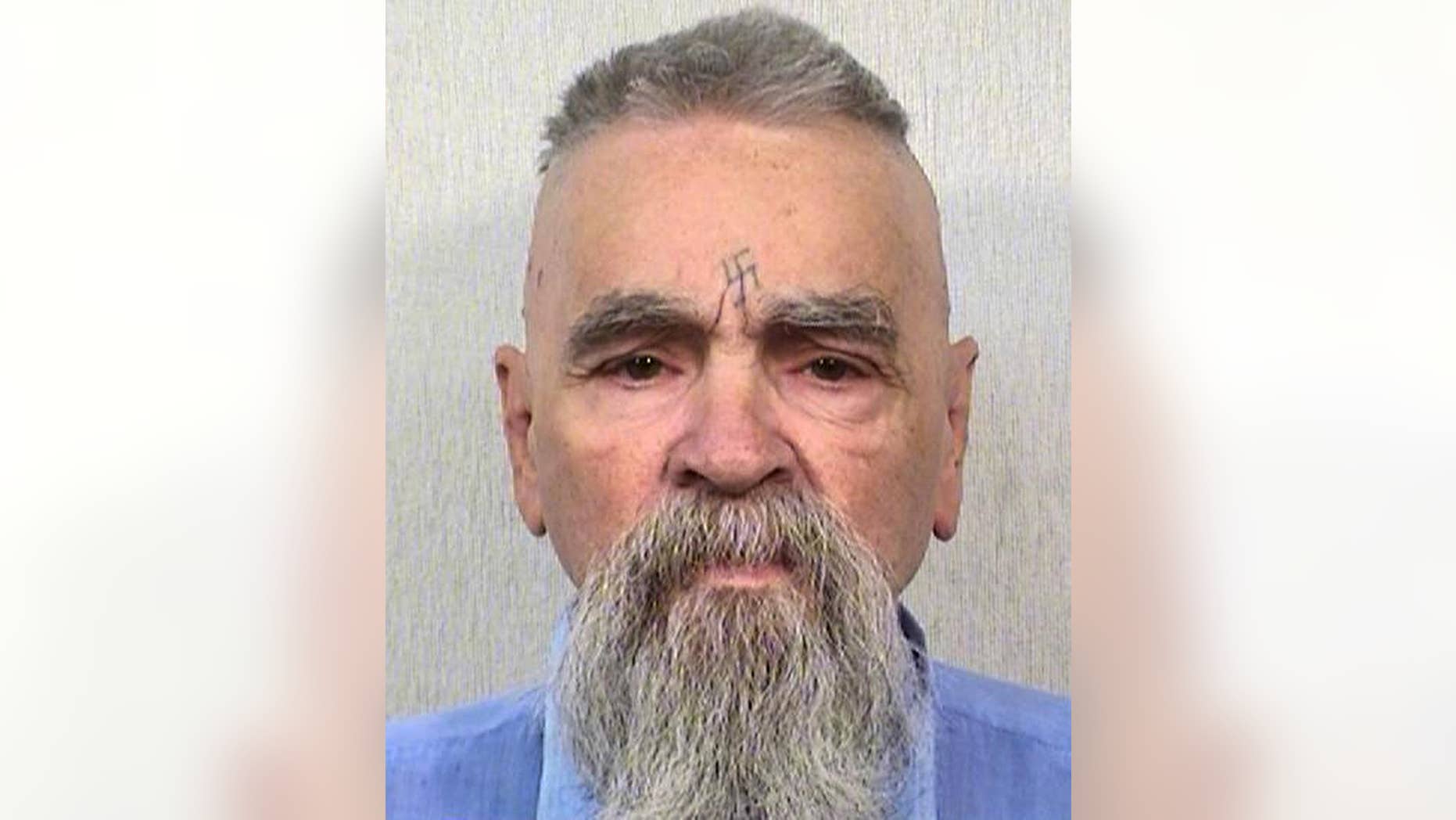FILE - This Oct. 8, 2014 file photo provided by the California Department of Corrections and Rehabilitation shows serial killer Charles Manson. California prison official says cult killer Manson is alive following reports that he was hospitalized on Tuesday, Jan. 3, 2017. (California Department of Corrections and Rehabilitation via AP, File)