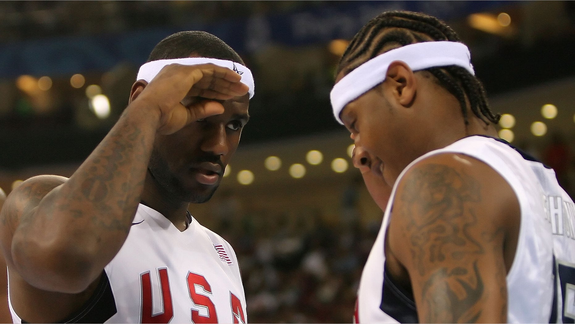 BEIJING - AUGUST 20: Lebron James #6 and Carmelo Anthony #15 of the United States salute one another before the men's basketball quarterfinal game against Australia at the Olympic Basketball Gymnasium during Day 12 of the Beijing 2008 Olympic Games on August 20, 2008 in Beijing, China. (Photo by Streeter Lecka/Getty Images)