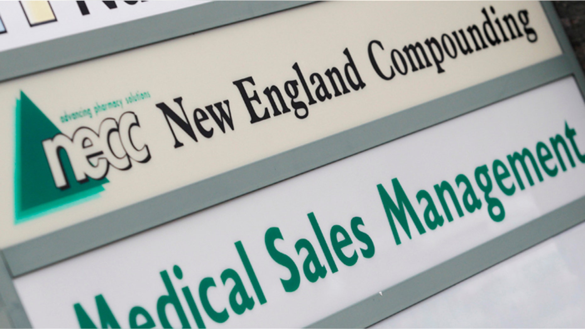 A sign for pharmaceutical compounding company New England Compounding Center (NECC).