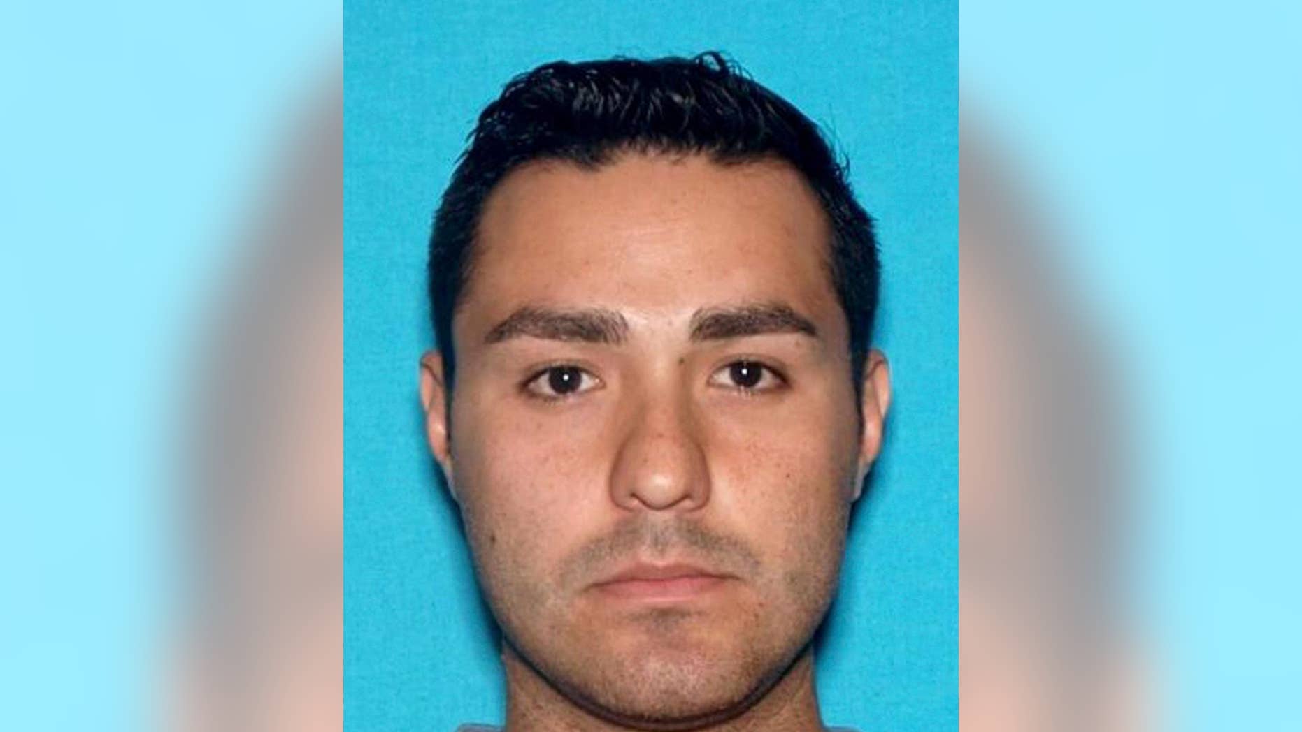 FILE - This undated file photo provided by the Pomona, Calif., Police Department shows Henry Solis. The rookie Los Angeles police officer charged with murder in the killing of a man during an off-duty fight fled with the help of his father to Texas where the men have family, according to a federal arrest warrant filed Thursday, March 19, 2015. The document says Solis called his father, Victor Solis of Lancaster, for help after a brawl outside a downtown Pomona bar early Friday in which Salome Rodriguez was shot multiple times and killed. (AP Photo/Pomona Police Department, File)