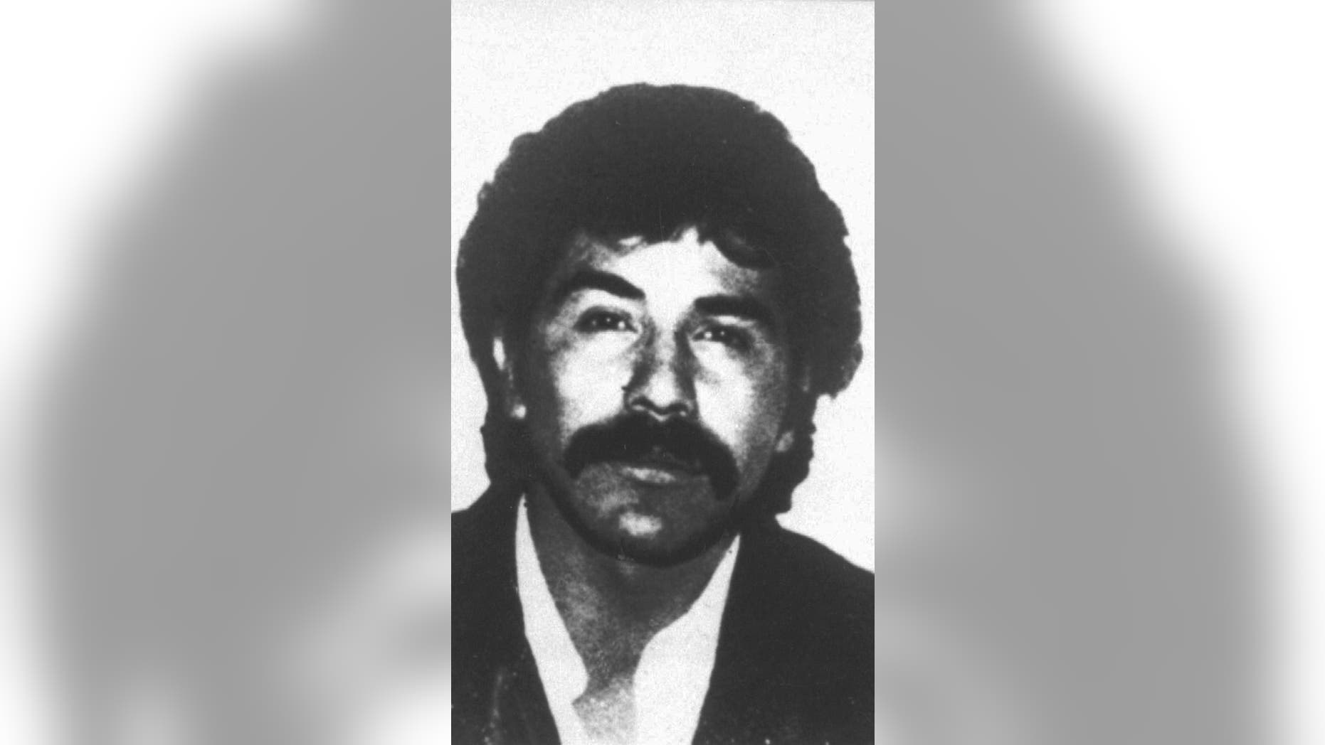 FILE - This undated file photo provided by Mexico's government shows drug lord Rafael Caro Quintero in an unknown location. Chihuahua Attorney General Jorge Gonzalez told reporters on Monday, July 4, 2016 that the old-guard drug lord mistakenly released in 2013 is apparently trying to get back into the drug trade. (Mexico's government via AP/File)