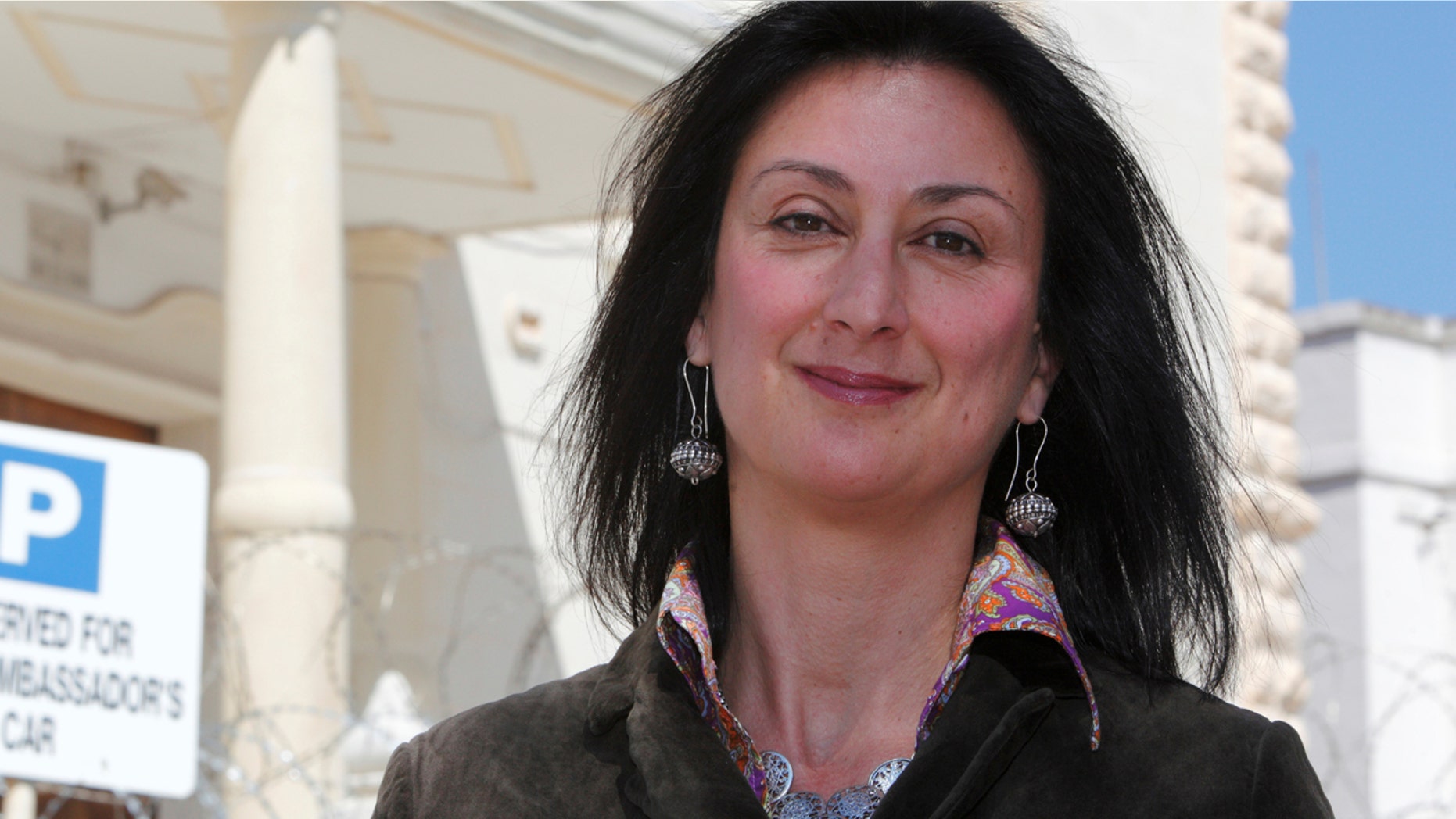 The sons of Maltese investigative journalist Caruana Galizia want the country's prime minister to resign and blame a "climate of impunity" on their mother's murder.