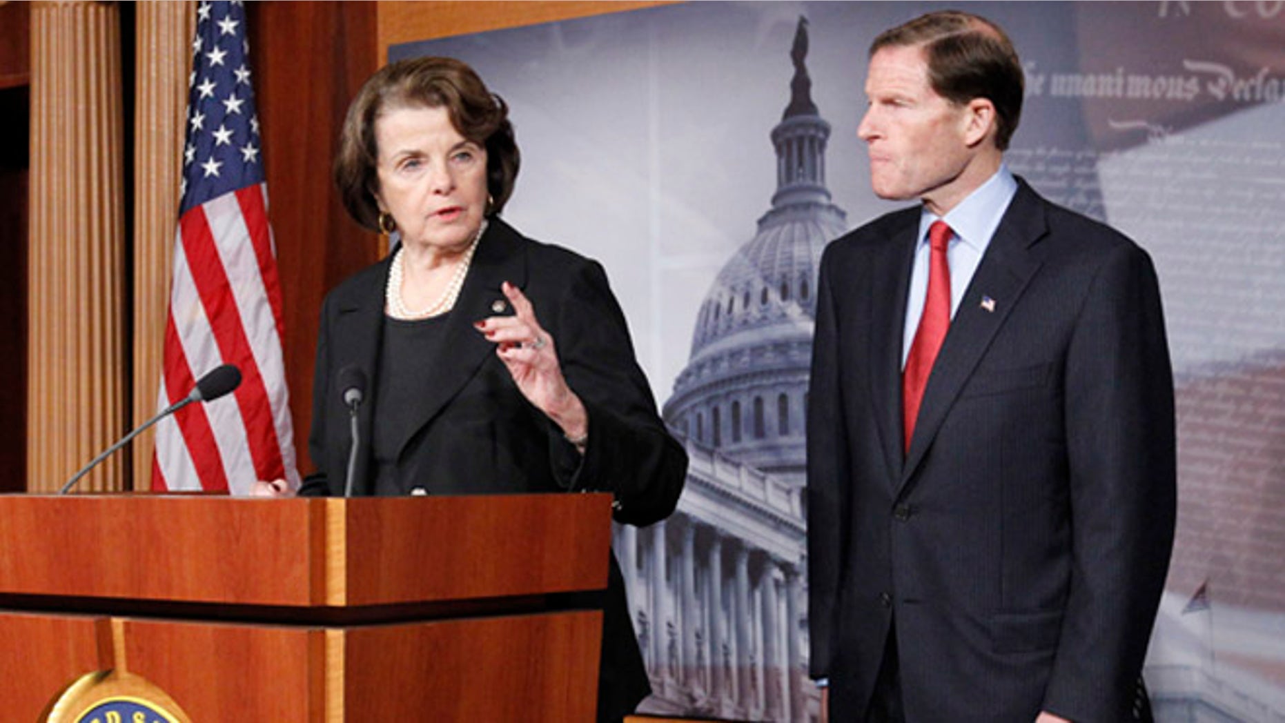 Dec. 21, 2012: Sen. Dianne Feinstein, left, speaks as she and Sen. Richard Blumenthal, right, discuss gun control on Capitol Hill.