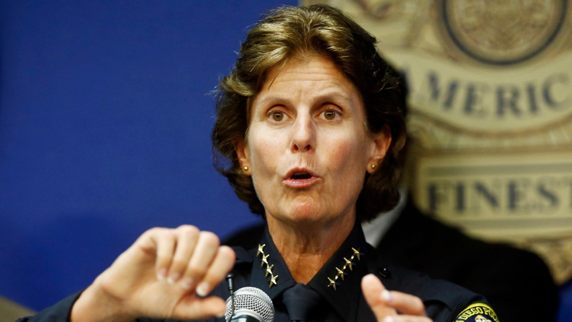FILE - In this Sept. 9, 2015 file photo, San Diego Police Chief Shelley Zimmerman talks about the results of the first year of body cameras being worn by approximately 800 police officers in San Diego. Zimmerman is among the growing number of women heading departments, many in need of image makeovers. (AP Photo/Lenny Ignelzi, File)