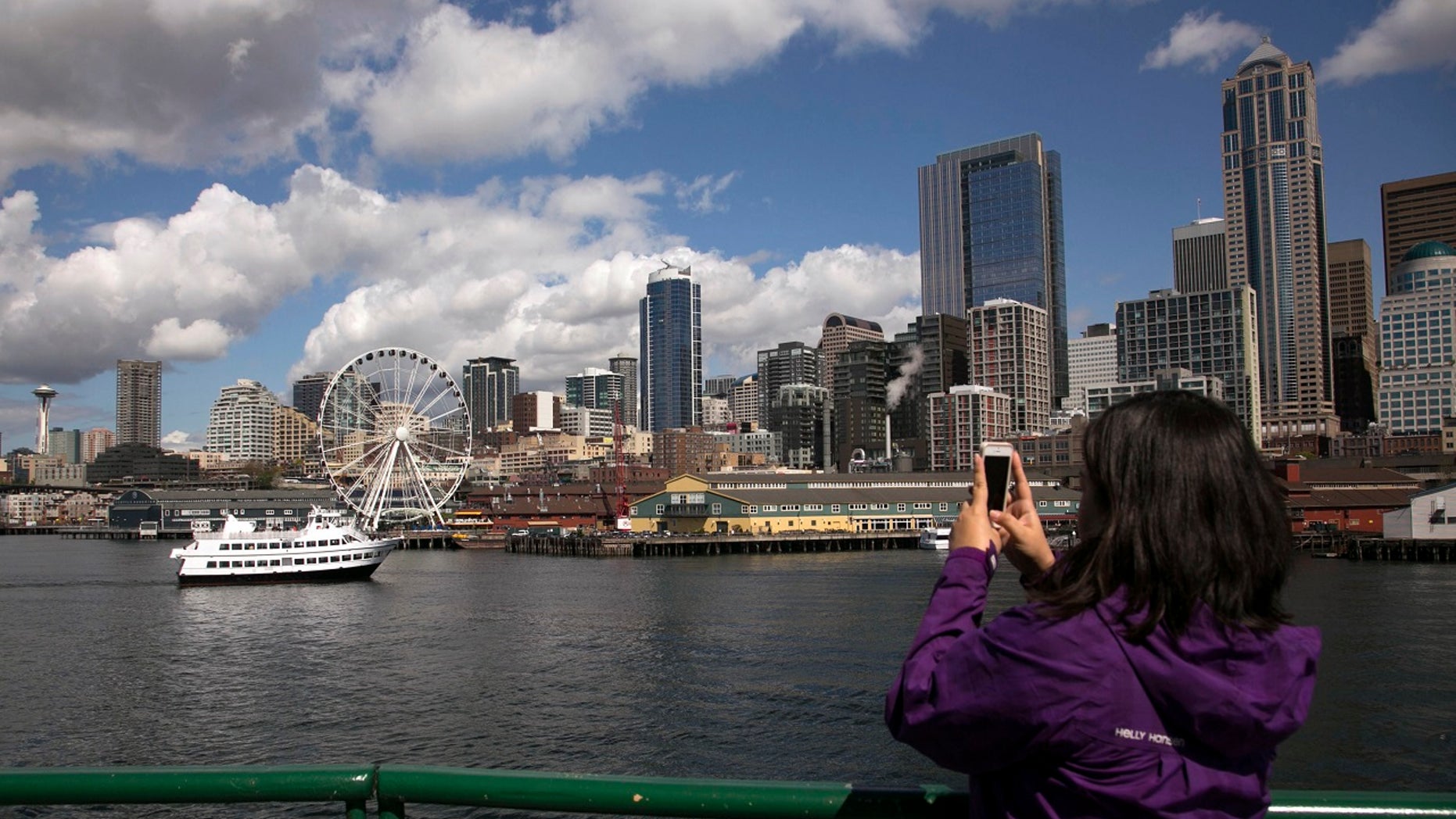 A fruitcake left underneath a Christmas tree in a Seattle ferry terminal temporarily halted service on Tuesday, police said.