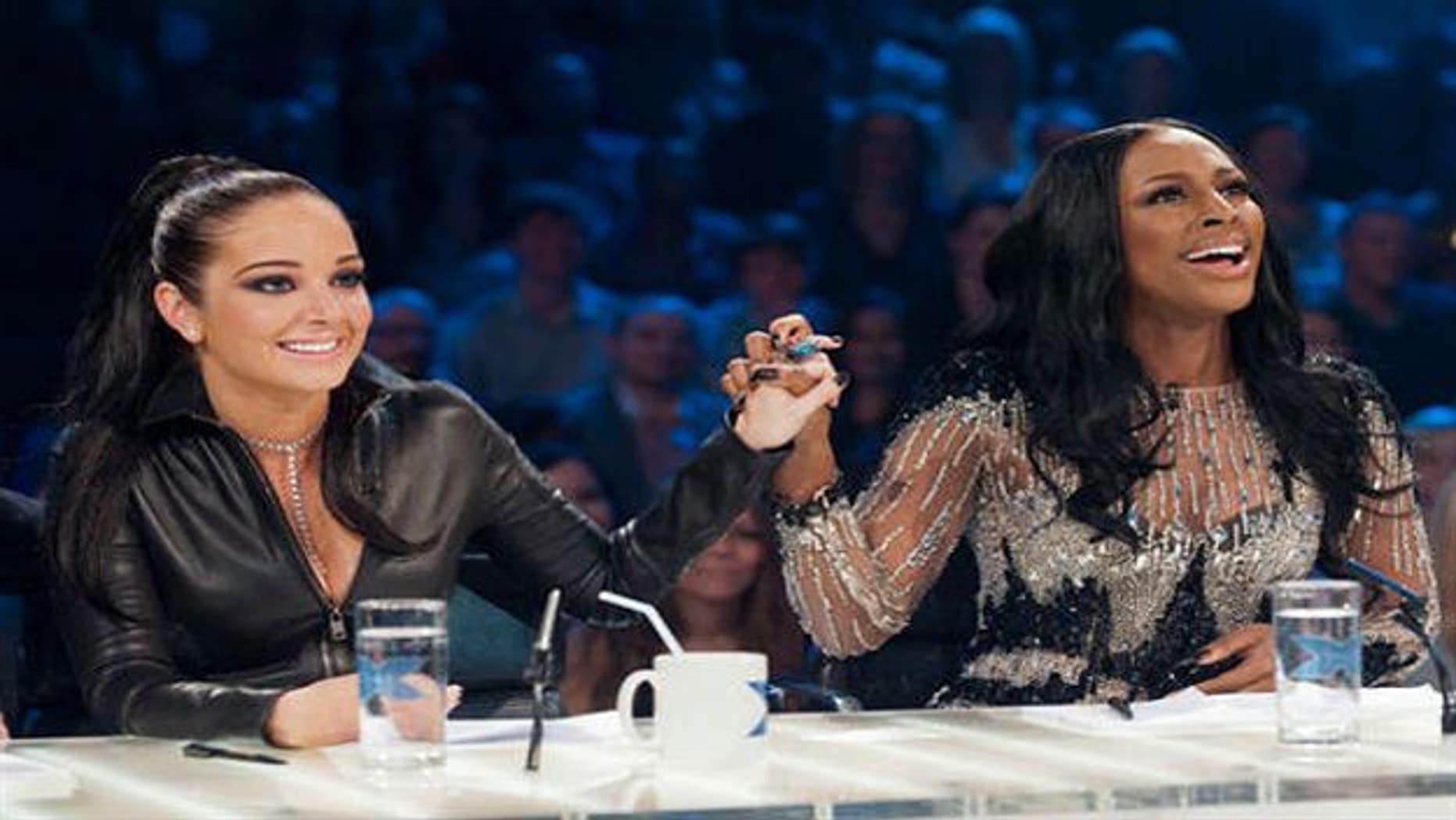 Tulisa Contostavlos and Alexandra Burke (l to r).