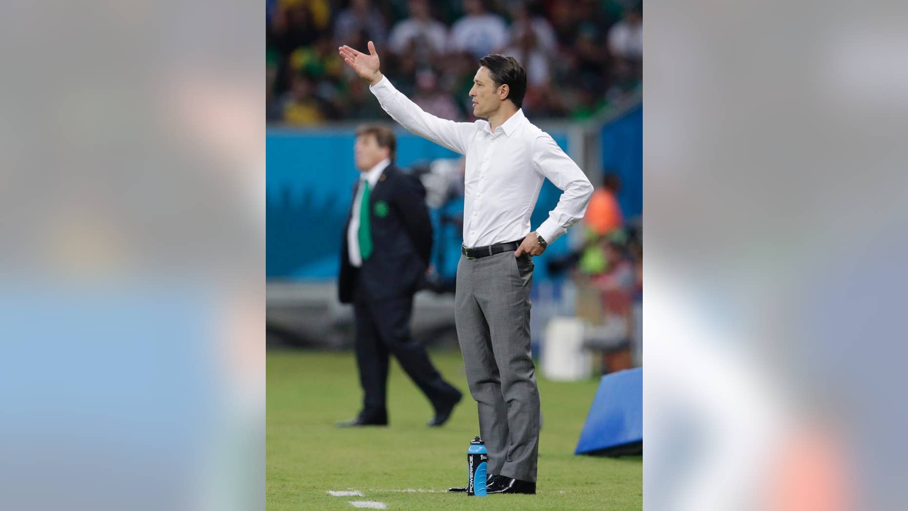 Croatia's coach Niko Kovac gestures during the group A World Cup soccer match between Croatia and Mexico at the Arena Pernambuco in Recife, Brazil, Monday, June 23, 2014. (AP Photo/Petr David Josek)