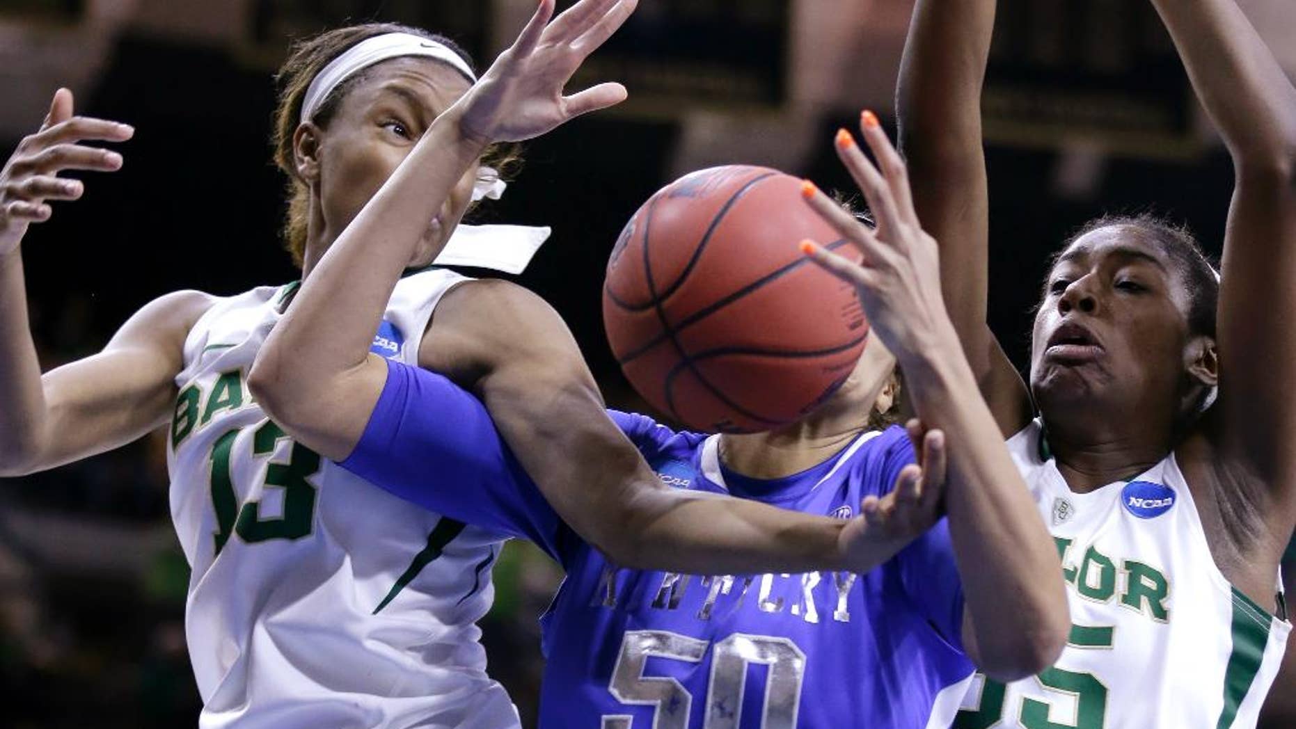 Kentucky center Azia Bishop (50), center, battles for a rebound against Baylor forward Nina Davis (13), left, and center Khadijiah Cave (505 during the second half of a regional semifinal in the NCAA college basketball tournament at the Purcell Pavilion in South Bend, Ind., Saturday, March 29, 2014. Baylor won 90-72. (AP Photo/Nam Y. Huh)