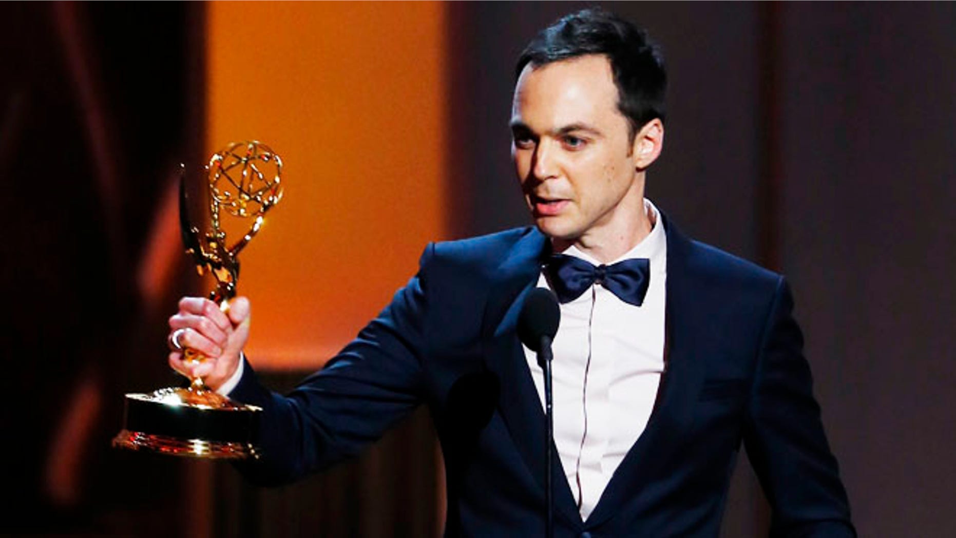 Jim Parsons accepts the award for Outstanding Lead Actor In A Comedy Series for his role in "The Big Bang Theory" at the 65th Primetime Emmy Awards in Los Angeles September 22, 2013. REUTERS/Mike Blake (UNITED STATES - Tags: ENTERTAINMENT) (EMMYS-SHOW) - RTX13VVS