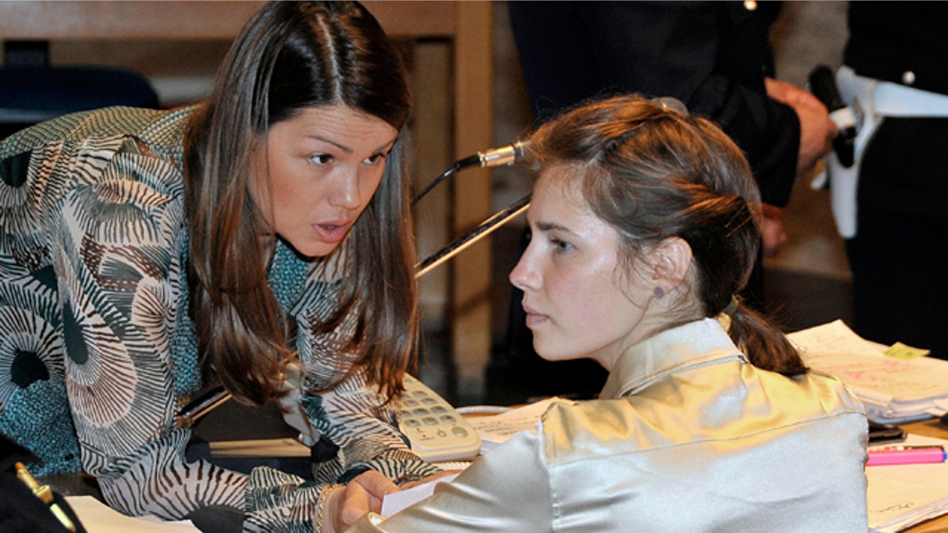 May 21: Amanda Knox, right, listens to her lawyer Maria Del Grosso, at the Perugia court, Italy.