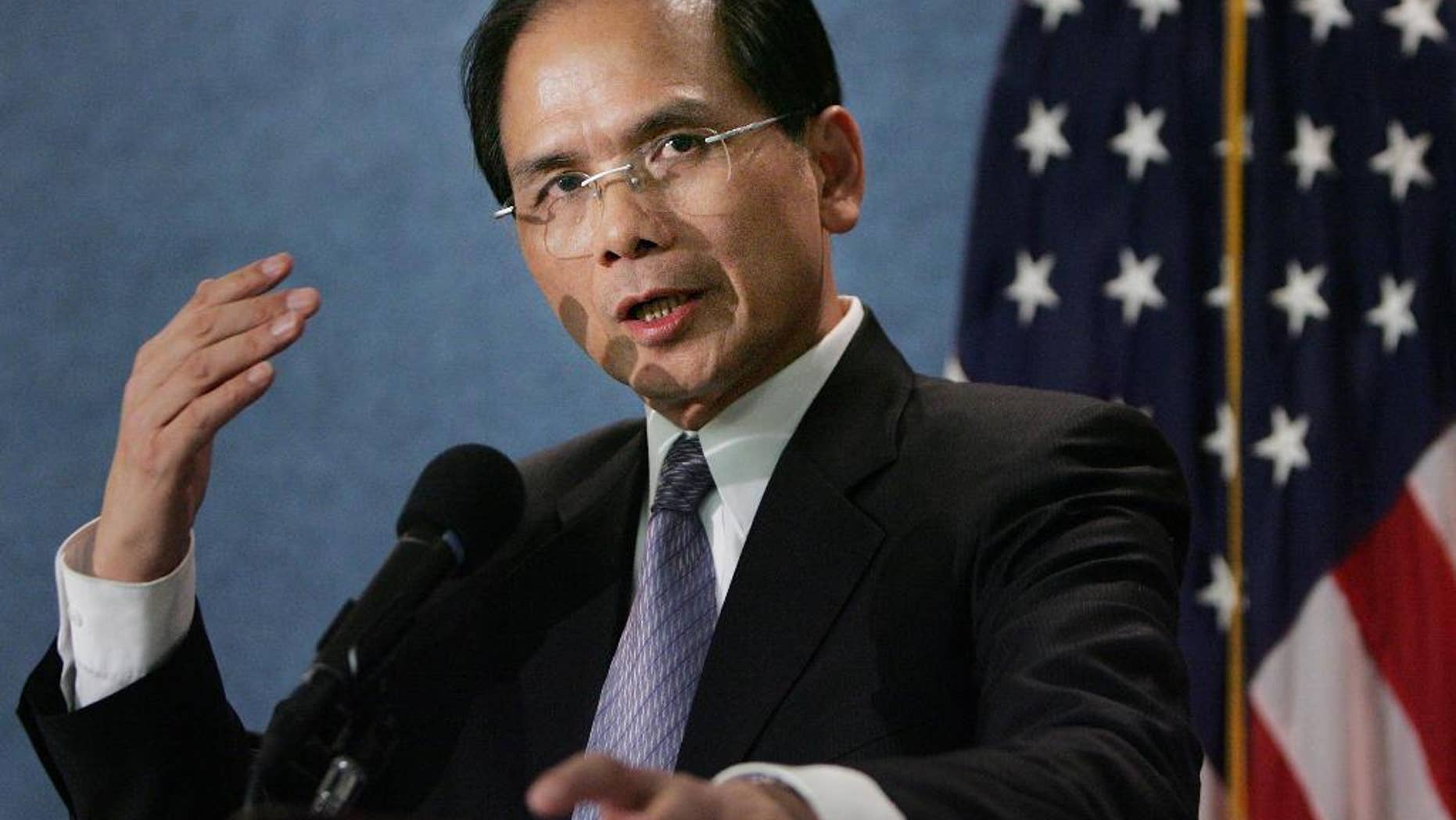 FILE - In this Tuesday, Sept. 12, 2006, file photo, Democratic Progressive Party member Yu Shyi-kun, speaks to the media during a news conference at the National Press Club in Washington DC. Yu will be joined by lawmakers and local government officials representing both Taiwan's ruling and opposition parties at Donald Trump's inauguration Friday, highlighting the unusually high profile during the presidential transition process. (AP Photo/Manuel Balce Ceneta, File)