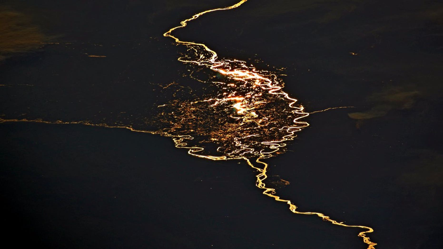Astronaut Jack Fischer tweeted an fantastic image of the Cuando and Zambesi rivers with the sun glinting off them creating a stunning fiery reflection.