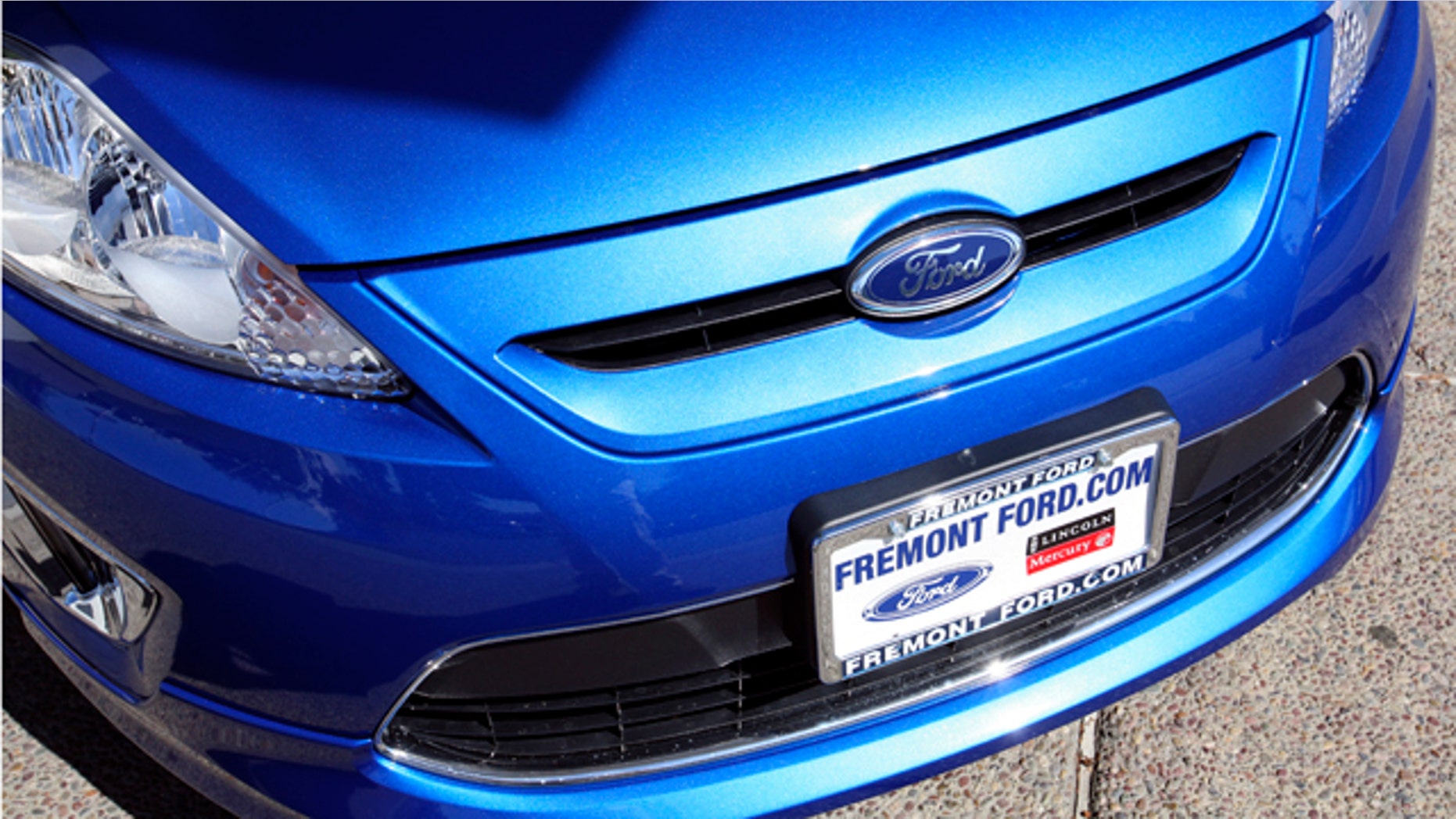 FILE - In this Sept. 28, 2010 file photo, a 2011 Ford Fiesta vehicle is shown for sale at Fremont Ford in Newark, Calif. "With gasoline prices eclipsing $3.90 a gallon, consumers are placing an even higher priority on fuel efficiency in every size and kind of vehicle," said Ken Czubay, Ford vice president, U.S. Marketing, Sales and Service. (AP Photo/Ben Margot)