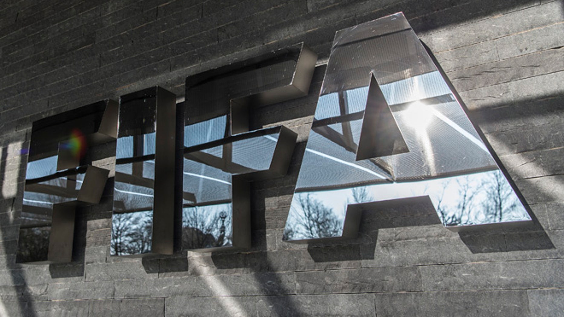 ZURICH, SWITZERLAND - MARCH 18: A FIFA sign at the entrance of its headquarters on March 18, 2016 in Zurich, Switzerland. (Photo by Valeriano Di Domenico/Getty Images)