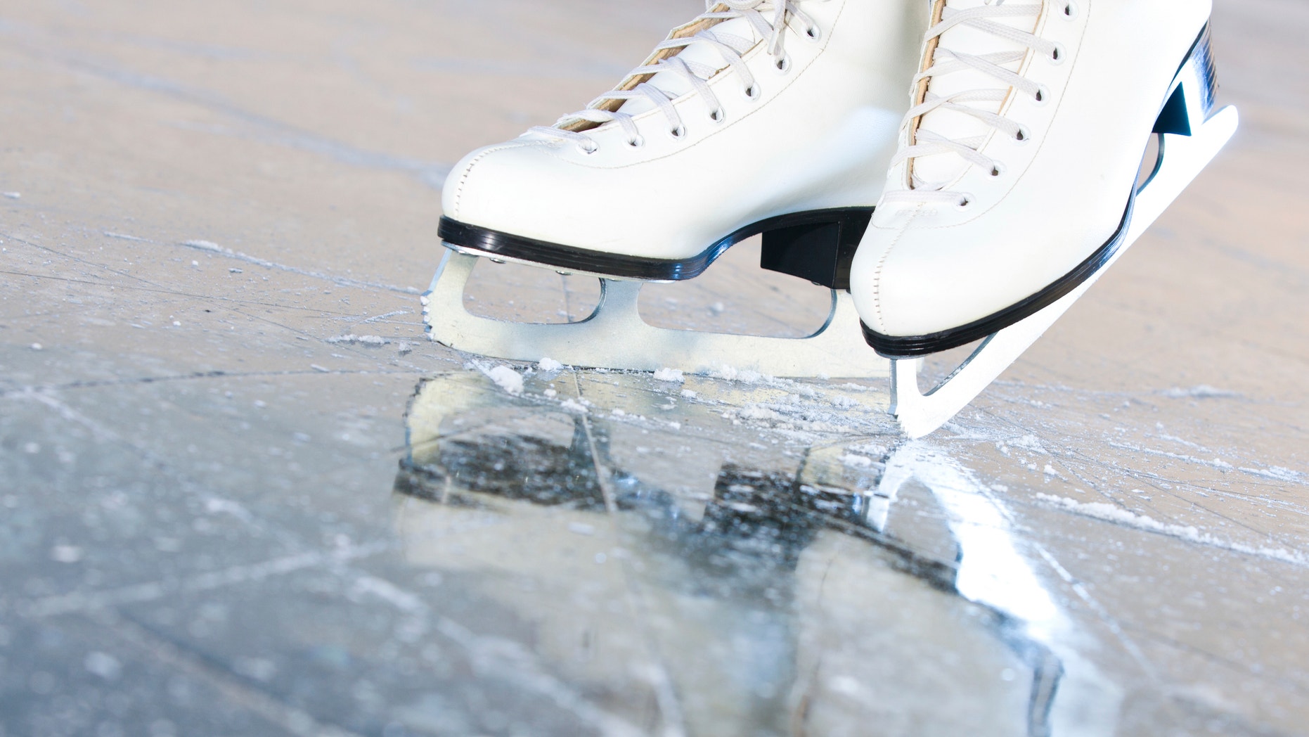 Tilted natural version, ice skates with reflection