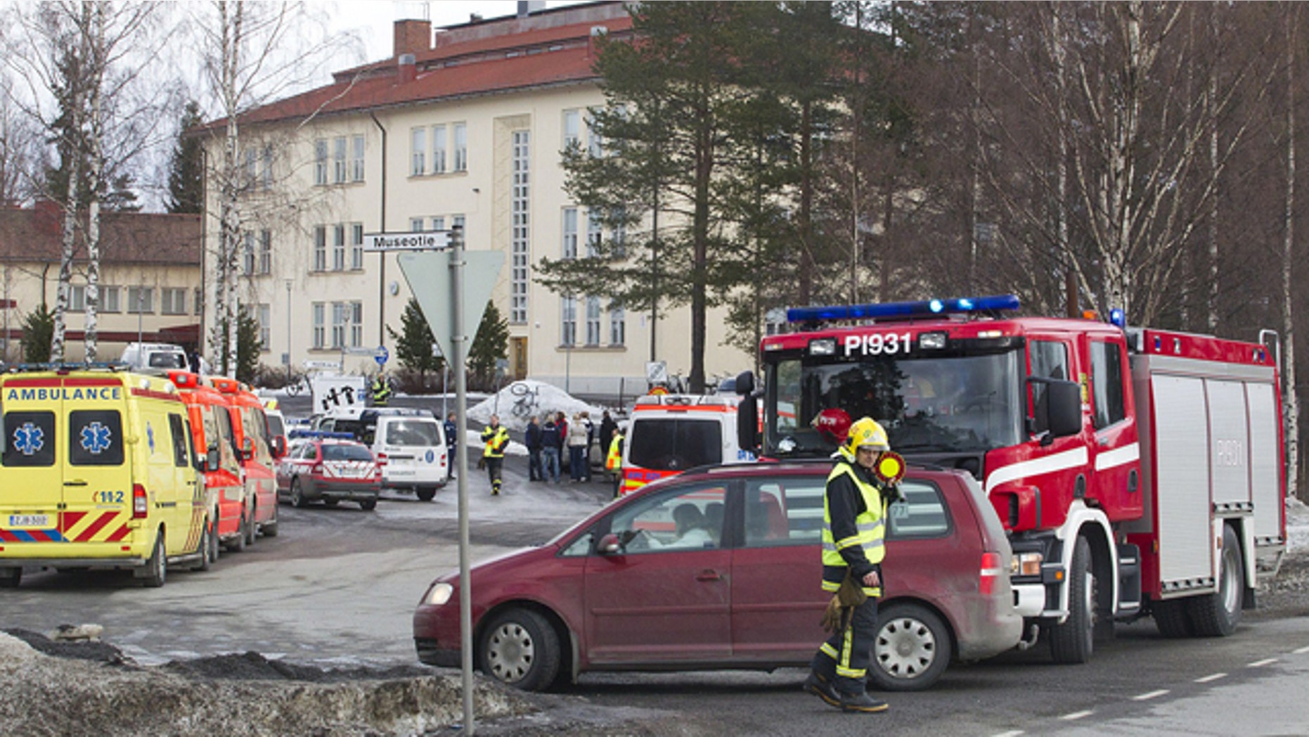 March 30, 2012: Emergency vehicles stand outside a secondary school in Orivesi, Finland. A gunman was arrested after firing several shots at the school in southern Finland but no one was injured in the incident, police said Friday.