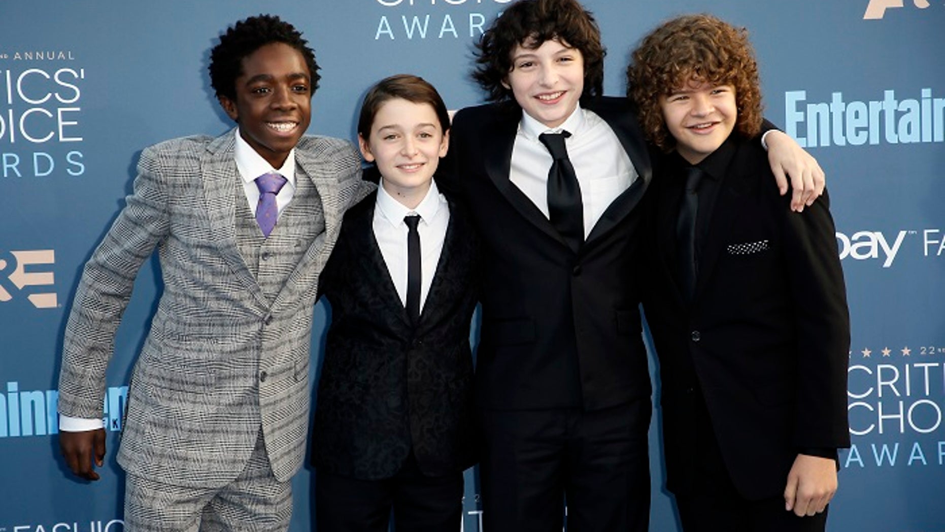 "Stranger Things" star Finn Wolfhard (pictured second from right) fired his agent who was accused of sexual assault.