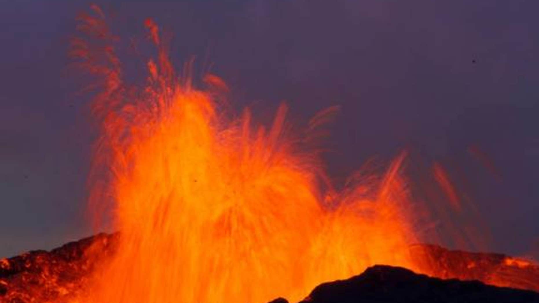 This fire-fountain eruption in Iceland is similar to those that peppered the moon shortly after its formation. The earthly explosion is driven by water and carbon dioxide gas, but new research suggests carbon monoxide was the culprit on the ear