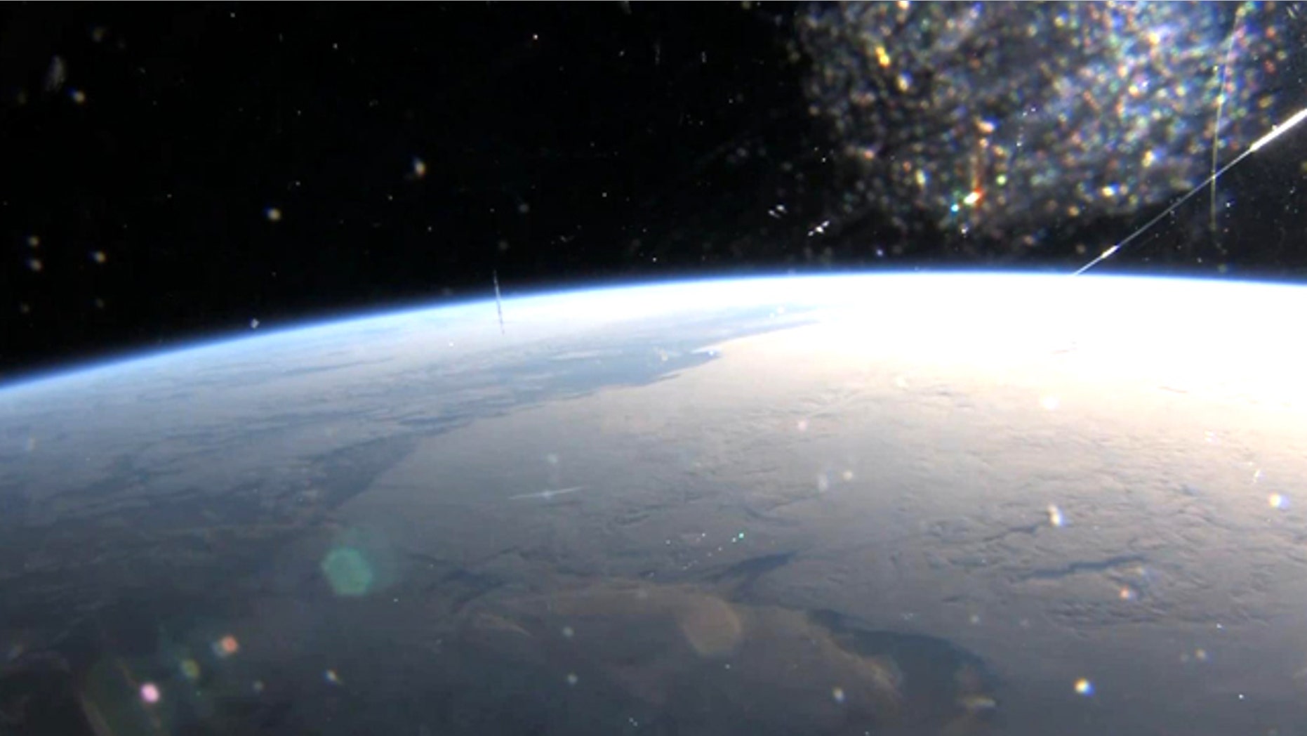 a screenshot from First Orbit, a new film that seeks to replicate the experience of Yuri Gagarin's famous first flight in space by combining archival audio with new footage from space.