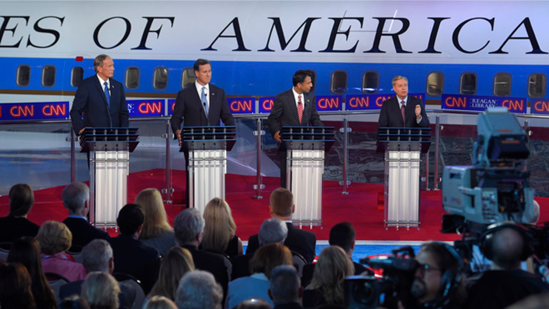 Sept. 16, 2015: Republican presidential candidates, former New York Gov. George Pataki, left, former Pennsylvania Sen. Rick Santorum, second from left, Louisiana Gov. Bobby Jindal, second from right, and Sen. Lindsey Graham, R-S.C., appear during the CNN Republican presidential debate at the Ronald Reagan Presidential Library and Museum on in Simi Valley, Calif.