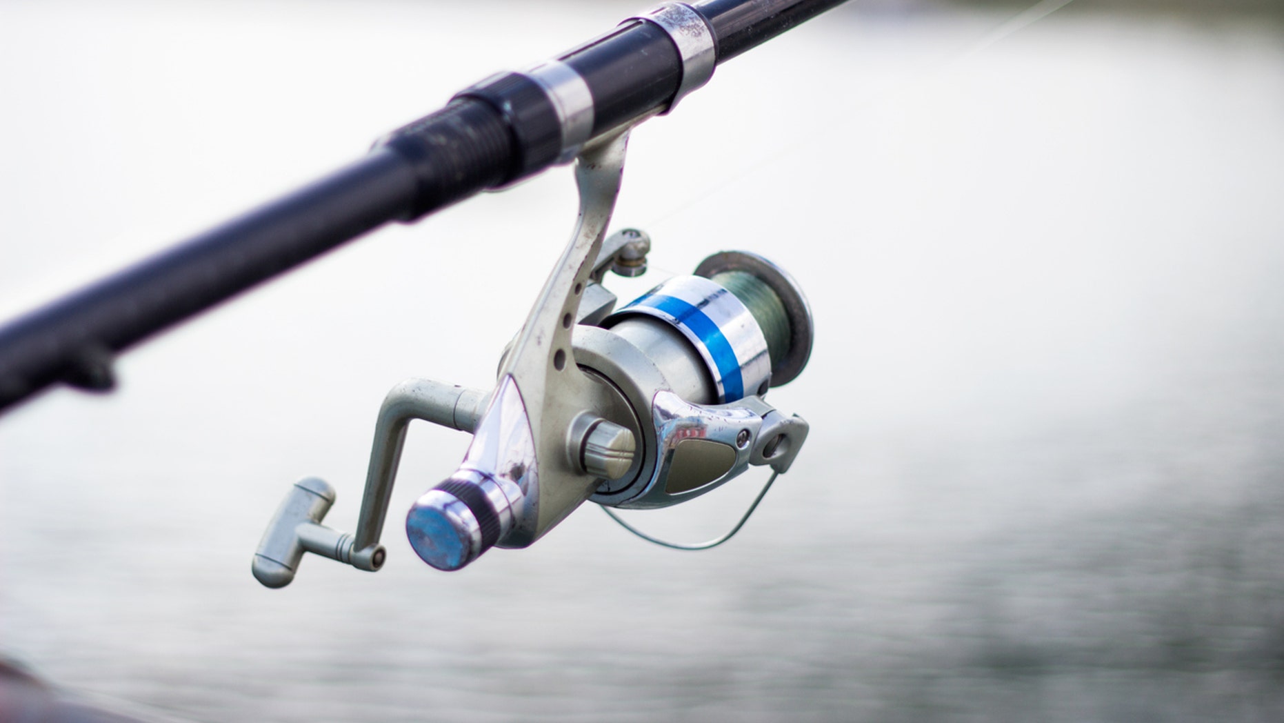 The woman, whose name is being withheld, was fishing with her husband off a pier.