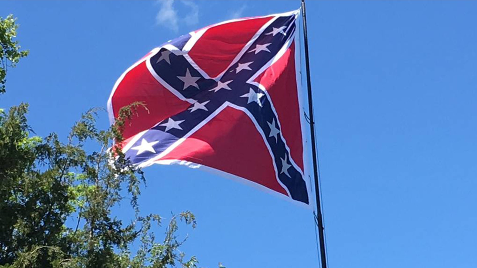 A Confederate flag flies over U.S. Highway 70 in Orange County, N.C.