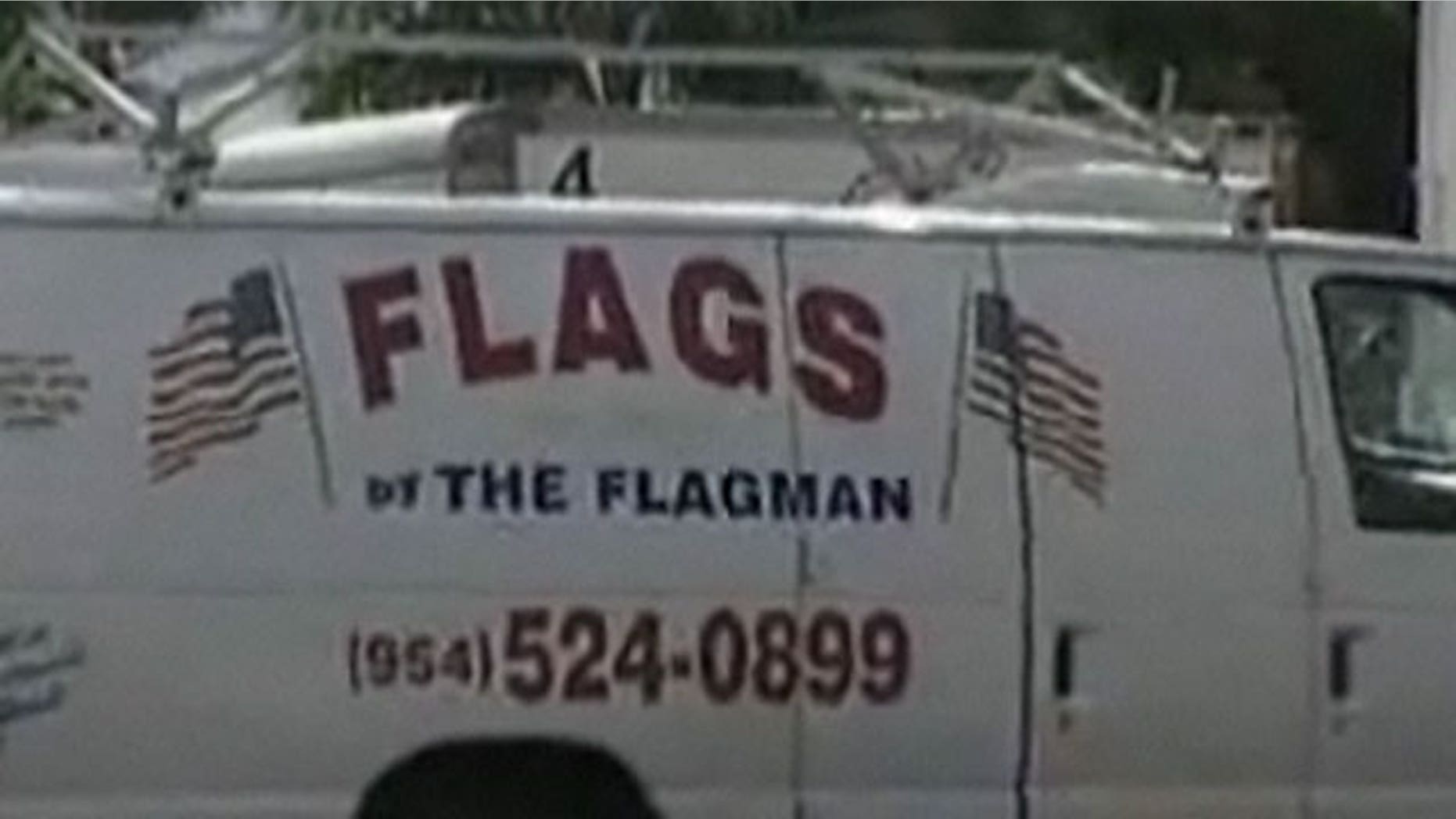 Andrew Chiotis, also known as "The Flagman," owns the van. He makes a living selling American flags.