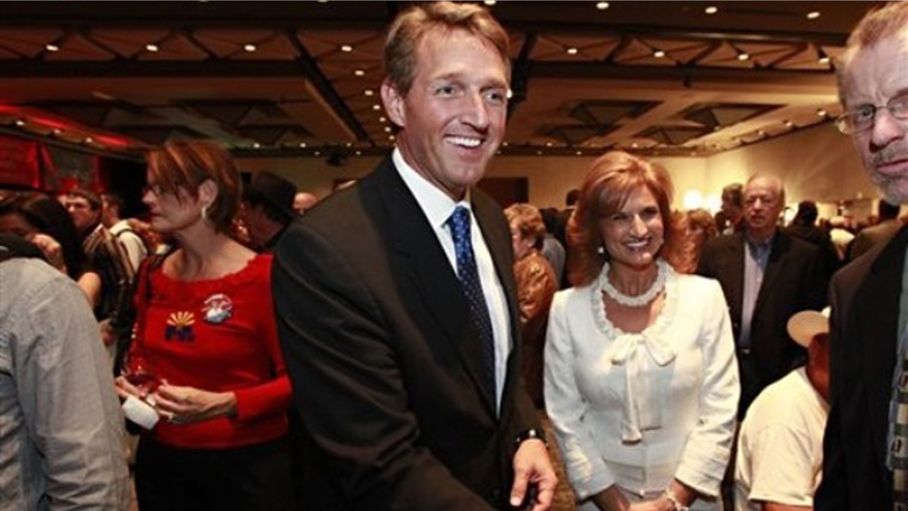 Rep. Jeff Flake, R-Ariz., and his wife, Cheryl Flake, greet supporters Nov. 2 at an election night party in Phoenix.