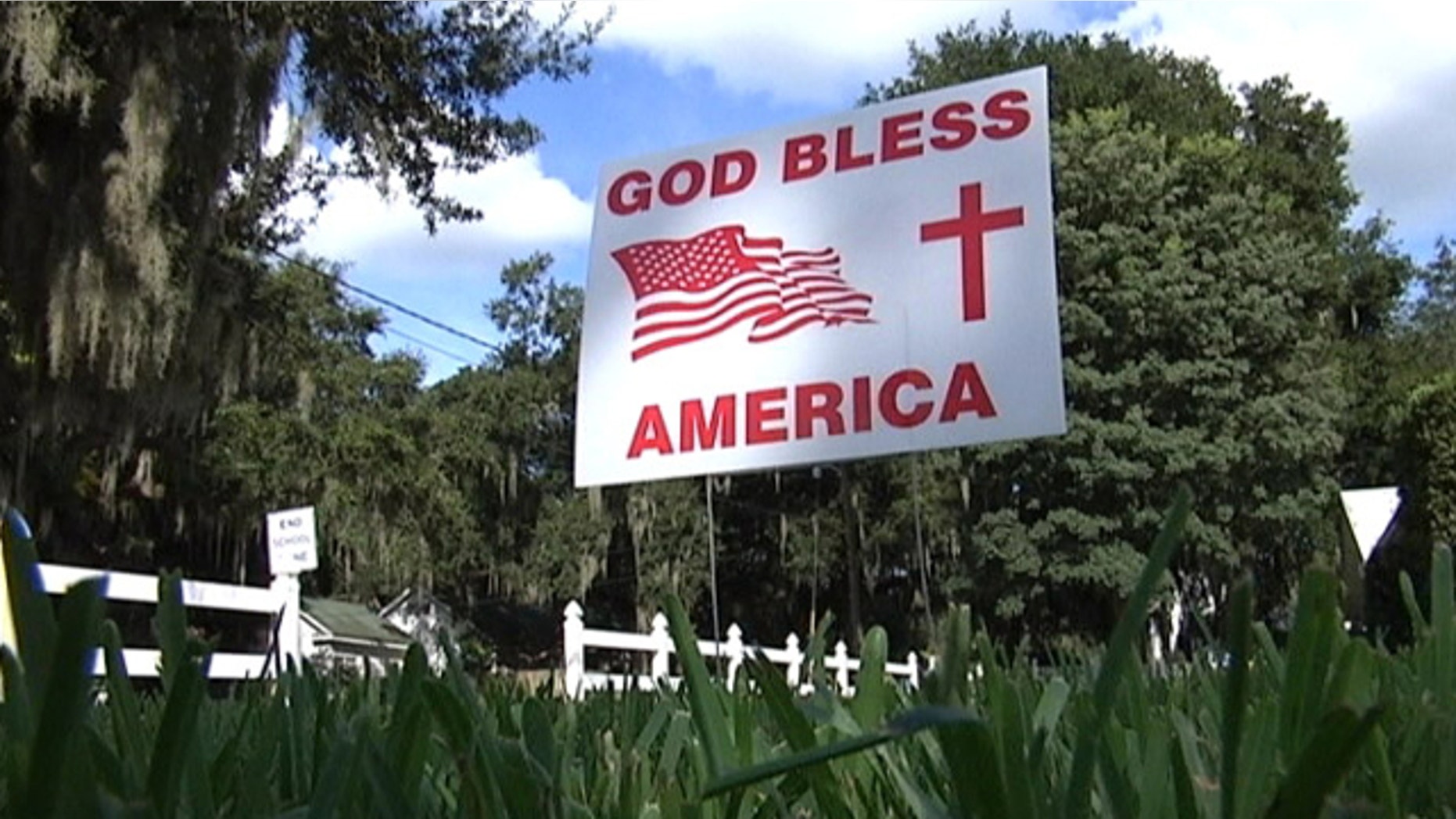 UNDATE: Officials in Bartow, Fla., are ordering residents who have placed "God Bless America" signs on their front lawns to remove them or pay a minimum fine of $25 a day.