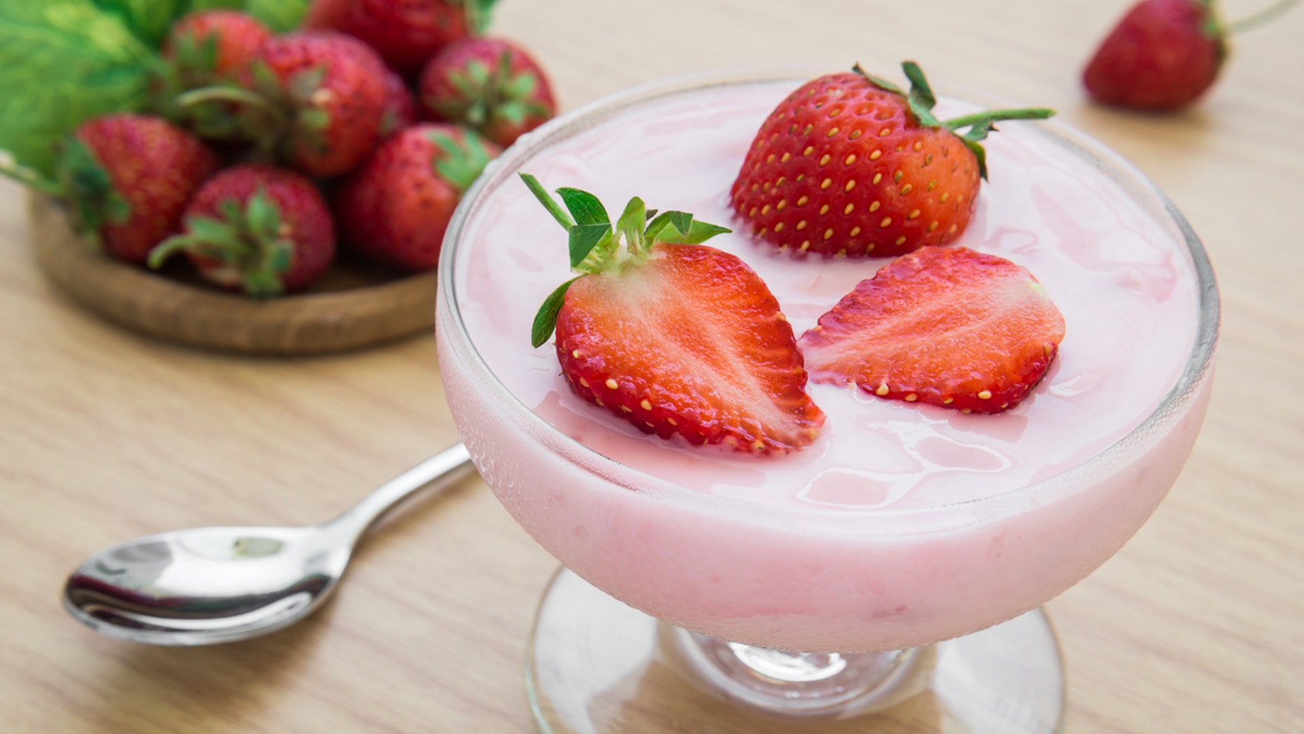 Yogurt with strawberry in glass