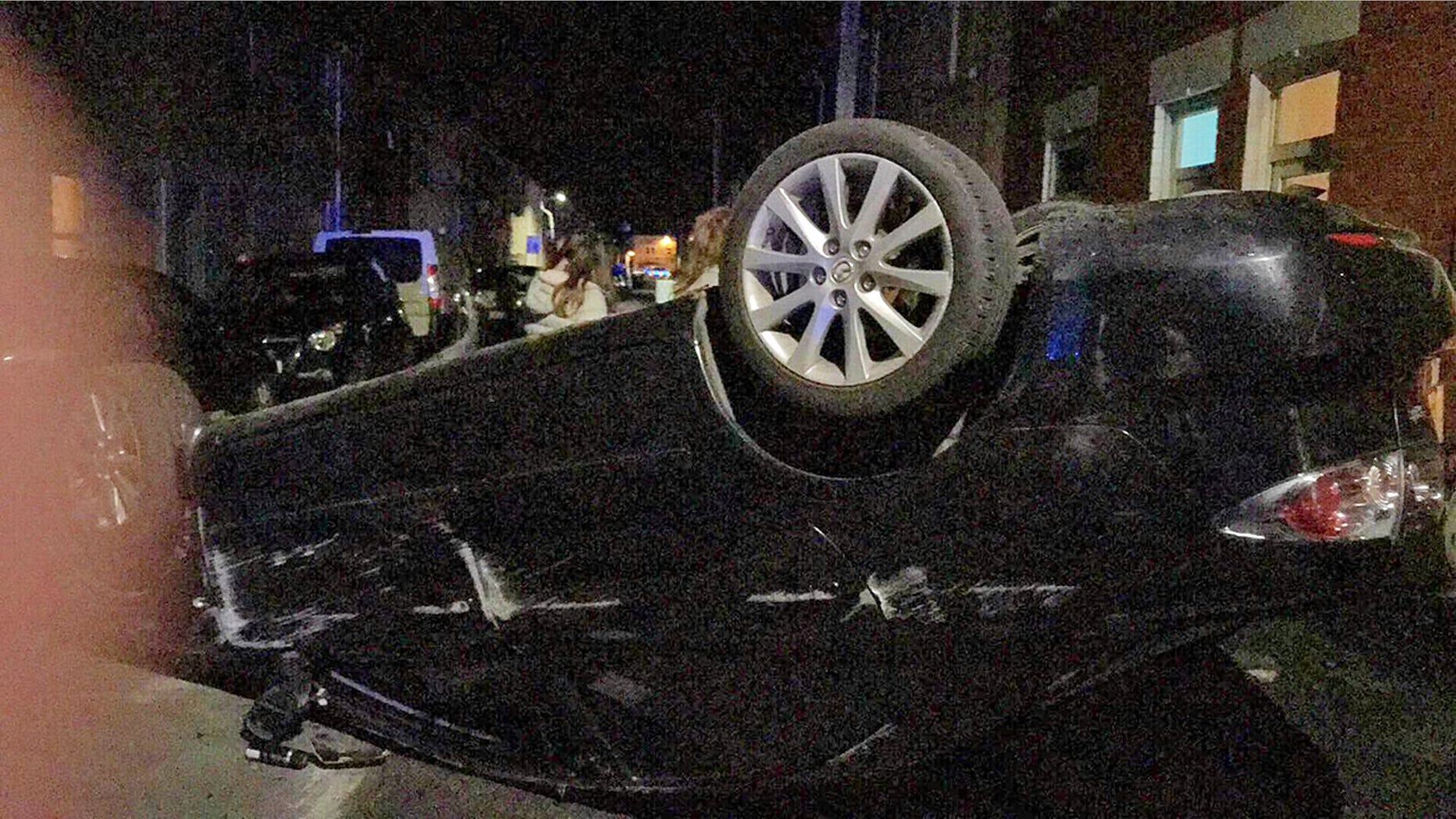 The scene of the crash.The scene of the crash. See SWNS story SWCRASH; ; A drink-driver has been jailed after he crashed and flipped his car - on the day he bought it. Ionut Condurache, 25, had downed seven beers and was three times over the alcohol limit when he got behind the wheel of his new black Mazda 6. The Romanian car wash worker did not have insurance and was disqualified from driving when he crashed into two parked cars in Cheltenham, Glos., last December. He fled the scene but was later spotted walking in the street and breathalysed. Prosecutor May Li told magistrates in Cheltenham, Glos: "He couldn't remember or explain how the crash happened.