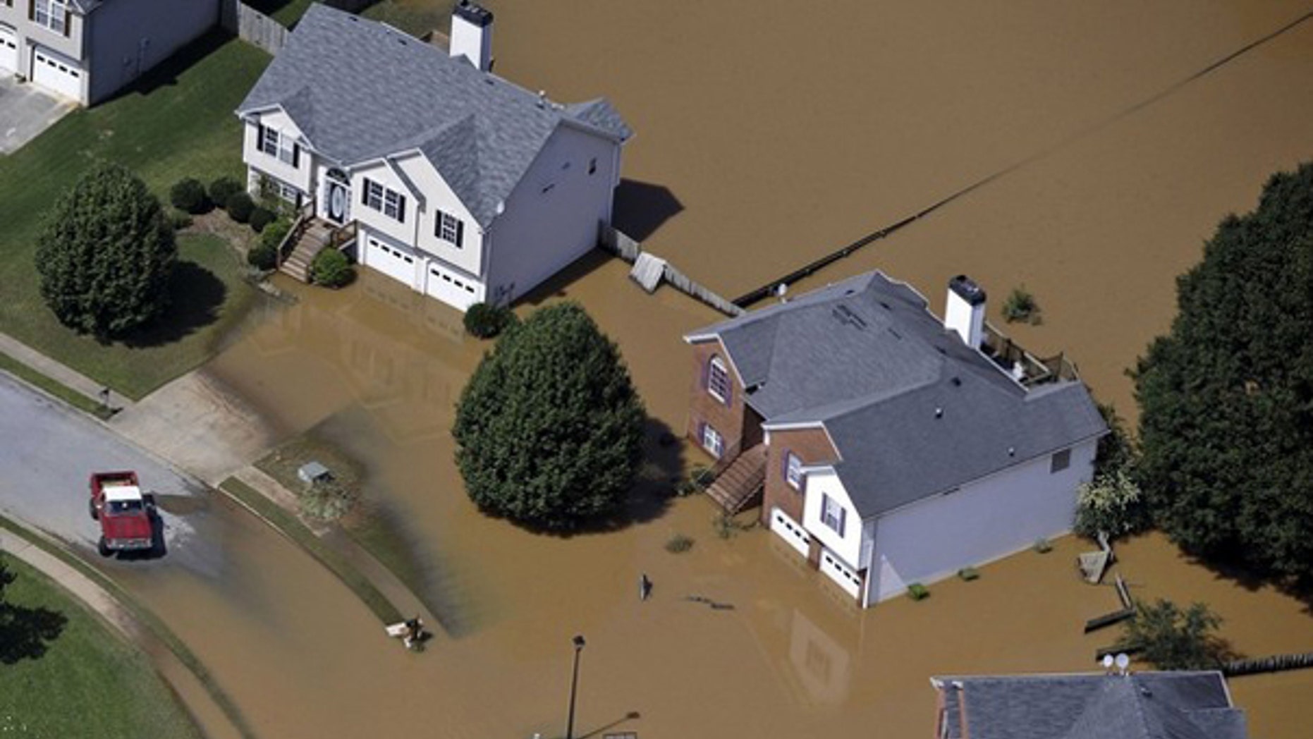 Shown here are homes in the Sweetwater Creek area of Atlanta, Ga., submerged in flood waters Sept. 23, 2009. (Reuters Photo)