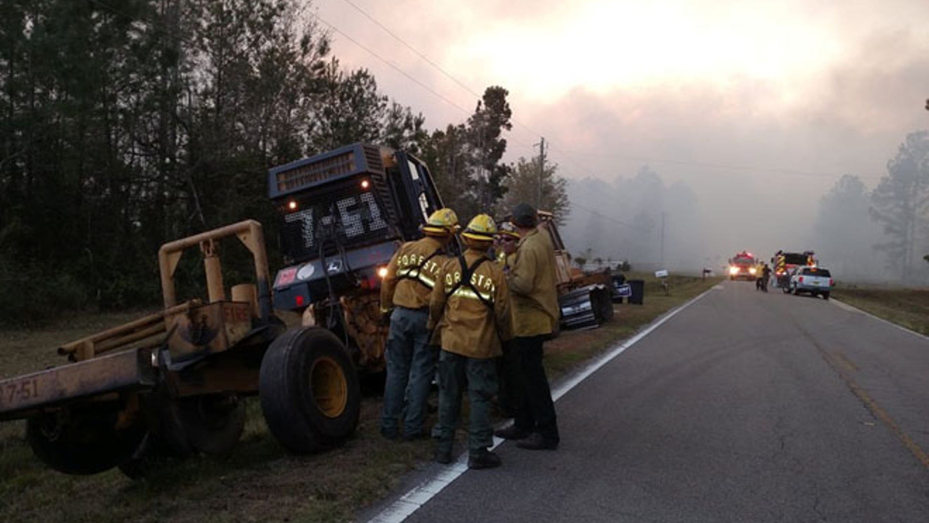 Firefighters arriving to battle a fire in Nassau County, Fla., last March.