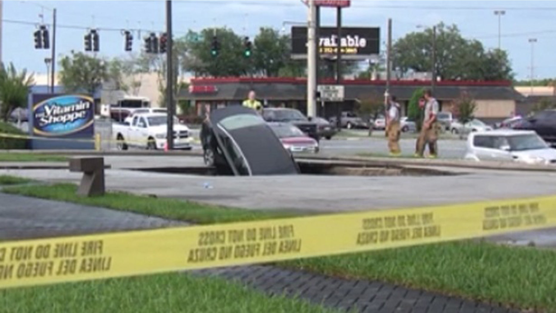 A sinkhole in Marion County swallowed a car, according to the Ocala Fire Department.