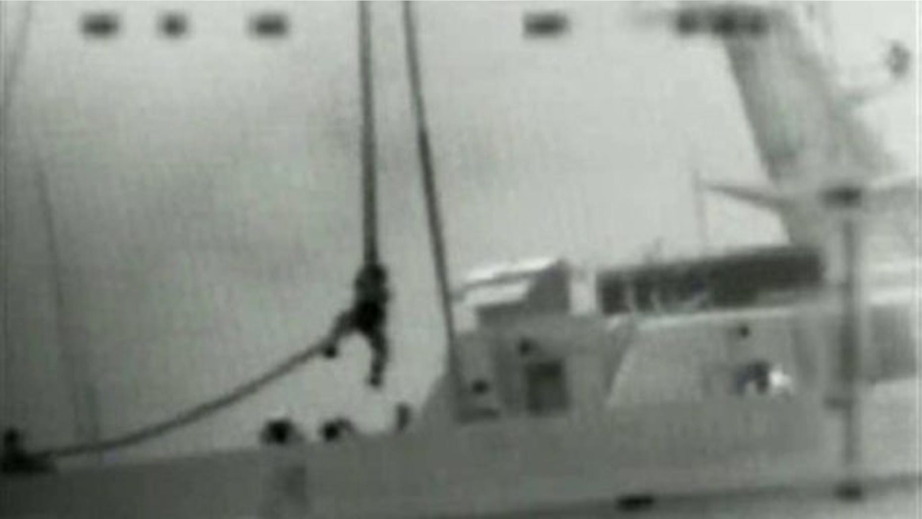 May 31, 2010: This image made from video provided by the Israeli Defence Force shows what the IDF says is one of several commandos being dropped onto the Mavi Marmara ship by helicopter in the Mediterranean Sea. Israeli commandos rappelled down to an aid flotilla sailing to thwart a Gaza blockade on Monday, clashing with pro-Palestinian activists on the lead ship in a raid that left at least nine passengers dead.