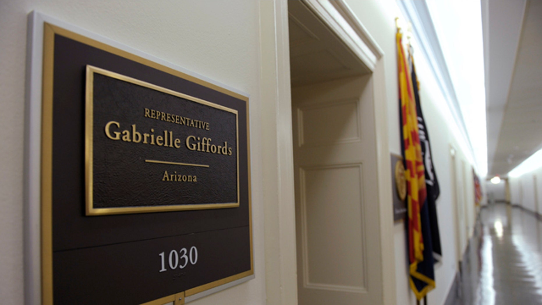 The sign for the Capitol Hill office of Rep. Gabrielle Giffords, D-Ariz., Saturday, Jan. 8, 2011 on Capitol Hill in Washington.