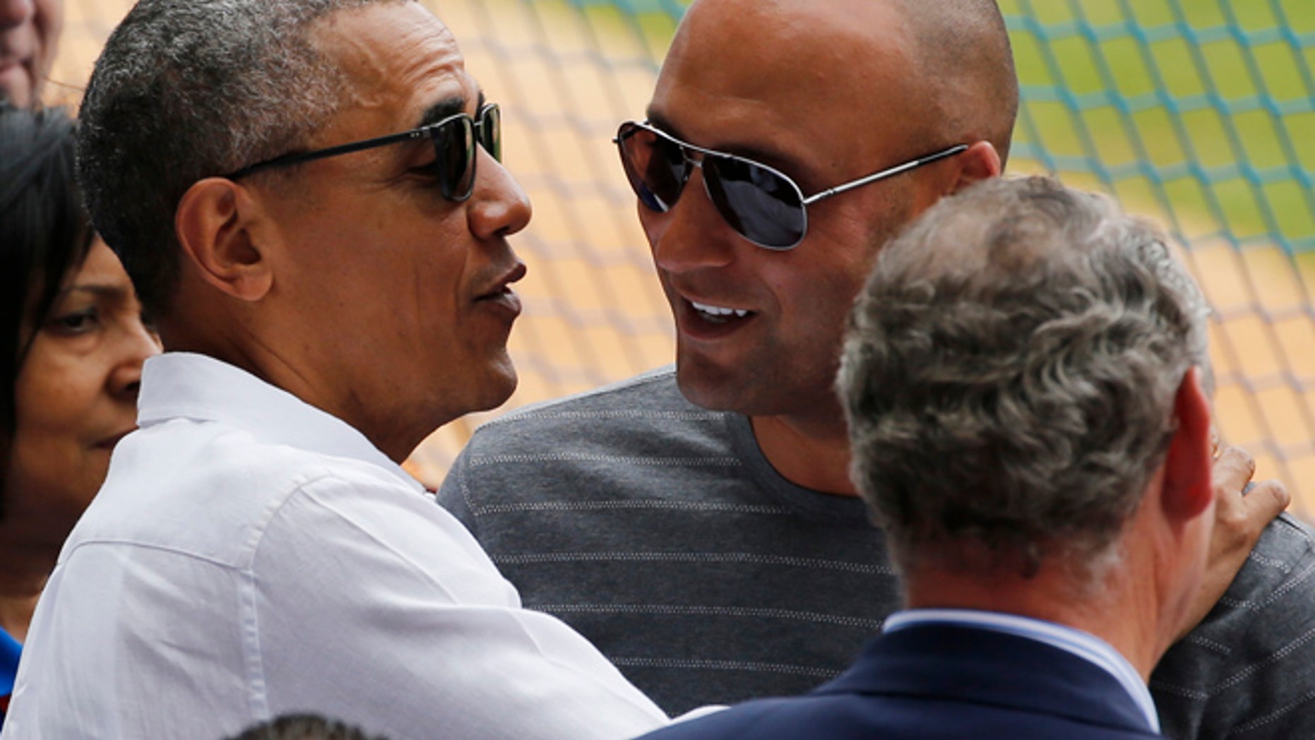 FILE 2016: Former New York Yankee Derek Jeter meets with President Obama in Havana.