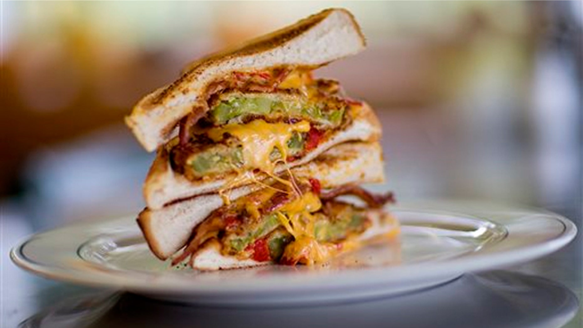 The Grant Stack, a sandwich made with Texas toast, fried green tomatoes, bacon and pimento cheese at the Home grown restaurant.