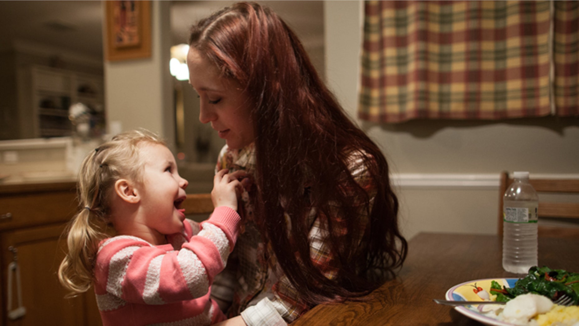 Jan. 25, 2014: Maggie Barcellano with daughter Zoe, 3, at her father's house in Austin, Texas.