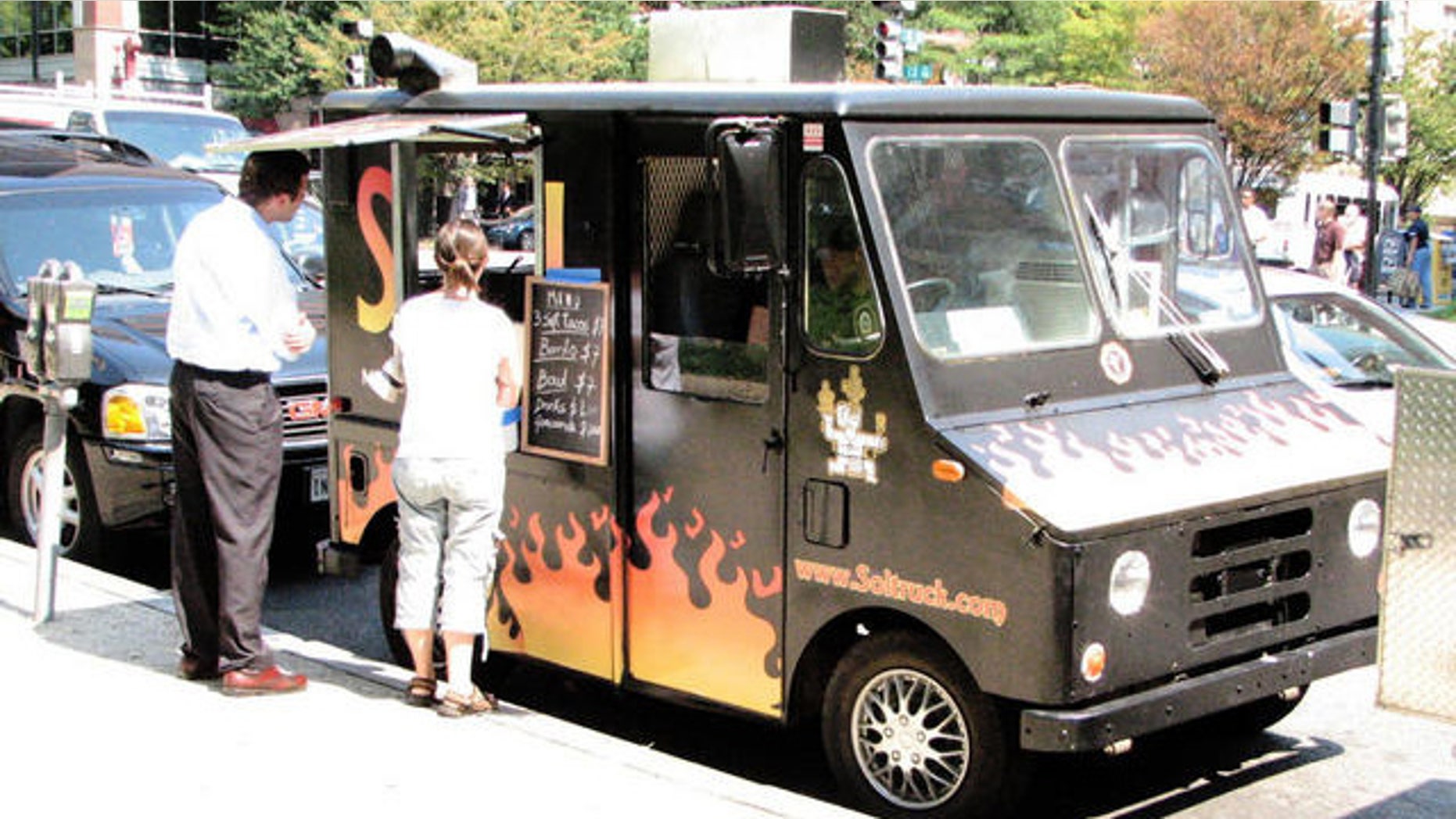 Sept. 14, 2011: Customers wait in line in front of a food vendor truck in Washington, D.C.