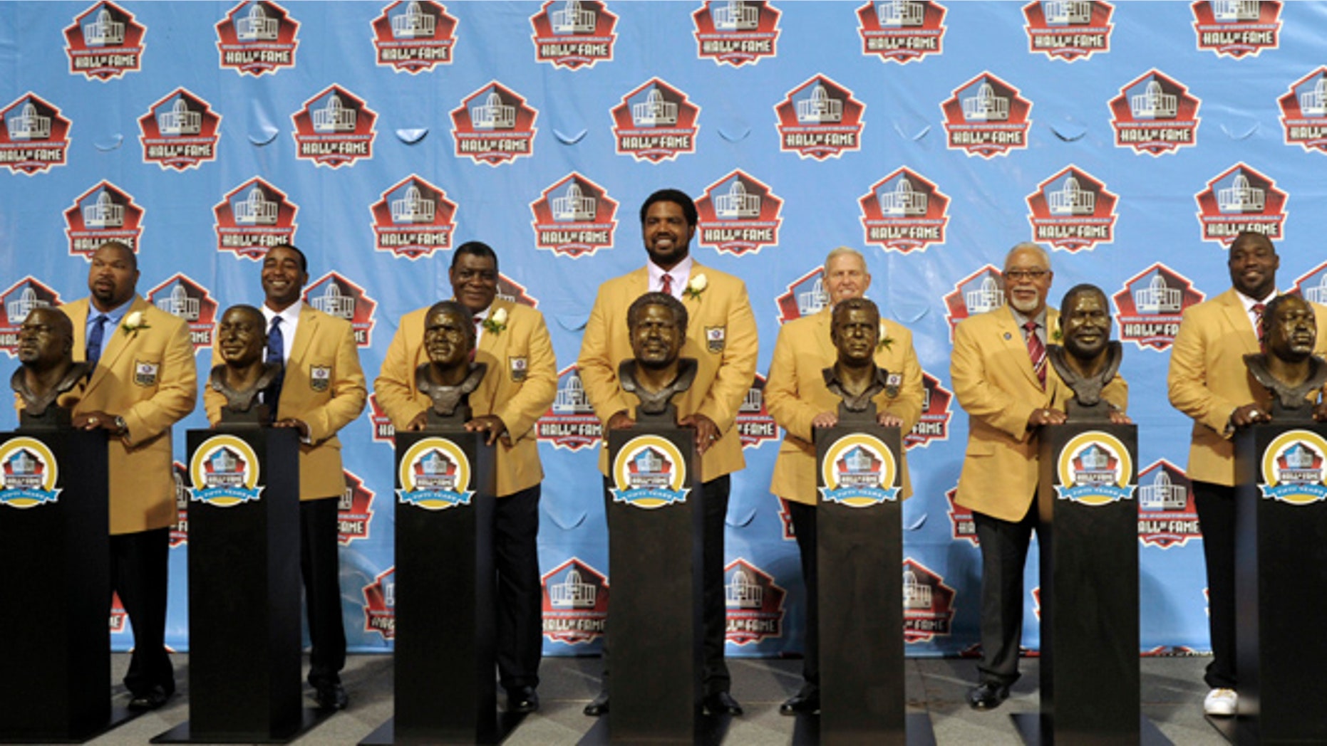 Aug. 3, 2013: Hall of Fame inductees, from left, Larry Allen, Cris Carter, Dave Robinson, Jonathan Ogden, Bill Parcells, Curley Culp and Warren Sapp pose with their bronze busts during the 2013 Pro Football Hall of Fame Induction Ceremony in Canton, Ohio.