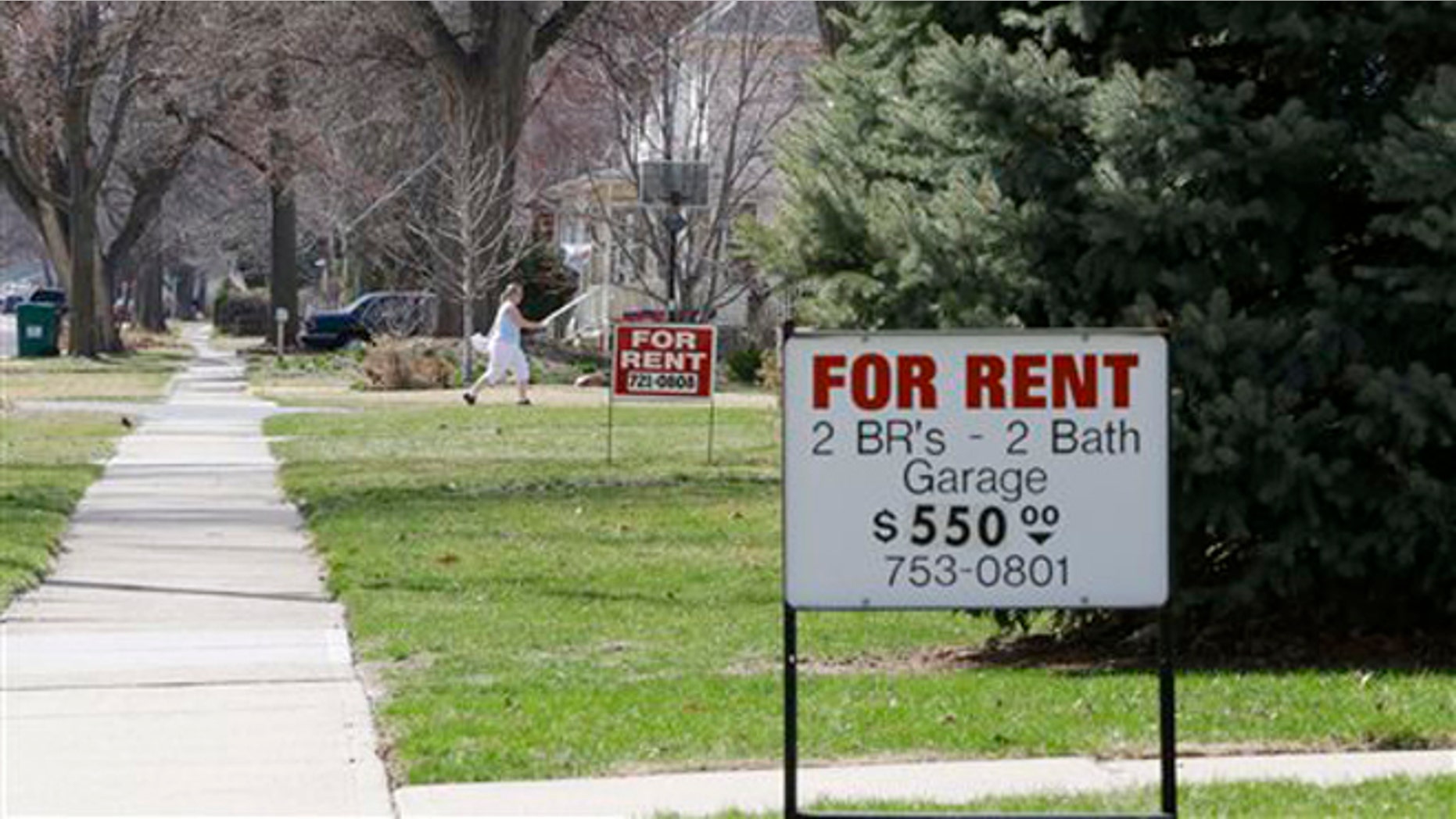 For Rent signs are seen in Fremont, Neb., Wednesday, April 9, 2014. Fremont police will begin issuing occupancy licenses to renters on Thursday, April 10, 2014, as part of the city's ordinance aimed at combating illegal immigration. (AP Photo/Nati Harnik)