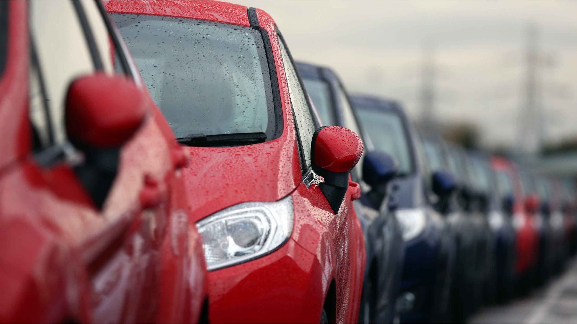 DAGENHAM, ENGLAND - JANUARY 13: Cars are prepared for distribution at a Ford factory on January 13, 2015 in Dagenham, England. Originally opened in 1931, the Ford factory has unveiled a state of the art GBP475 million production line that will start manufacturing the new low-emission, Ford diesel engines from this November this will generate more than 300 new jobs, Ford currently employs around 3000 at the plant in Dagenham. (Photo by Carl Court/Getty Images)
