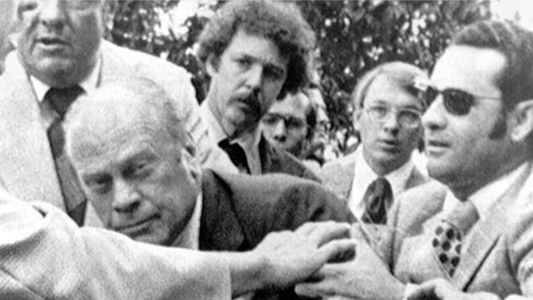 FILE: Sept. 15, 1975: President Gerald Ford is shielded by the Secret Service after an assassination attempt by Lynette "Squeaky" Fromme. President Ford had spoken at a "Host Breakfast," and was walking to California's state Capitol in Sacramento, Calif.