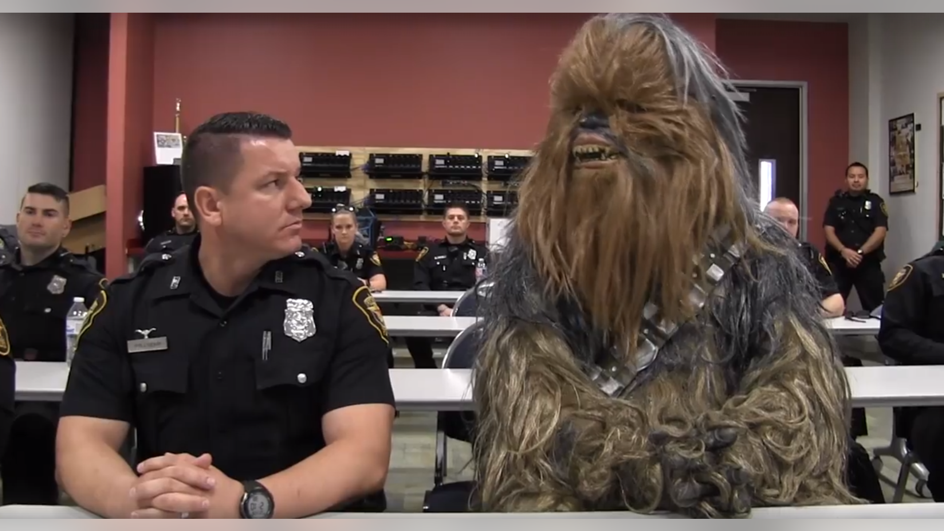 In a framegrab from the video starring Jimmy and Chewbacca, the pair show what a typical day on the force looks like.
